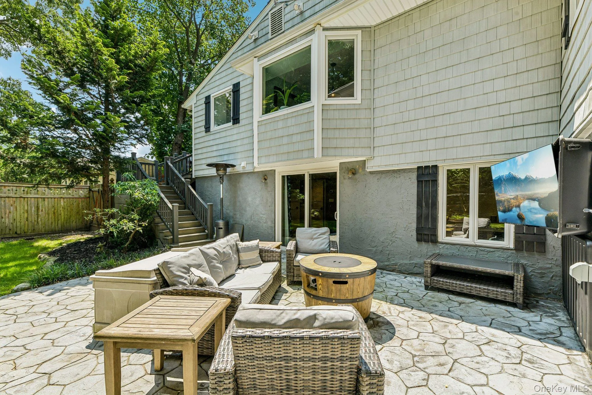 Rear Patio with Stairs leading to Side Deck Rear Patio with Stairs leading to Side Deck