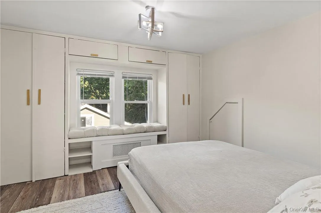 2nd bedroom with dark hardwood / wood-style flooring 2nd bedroom with dark hardwood / wood-style flooring