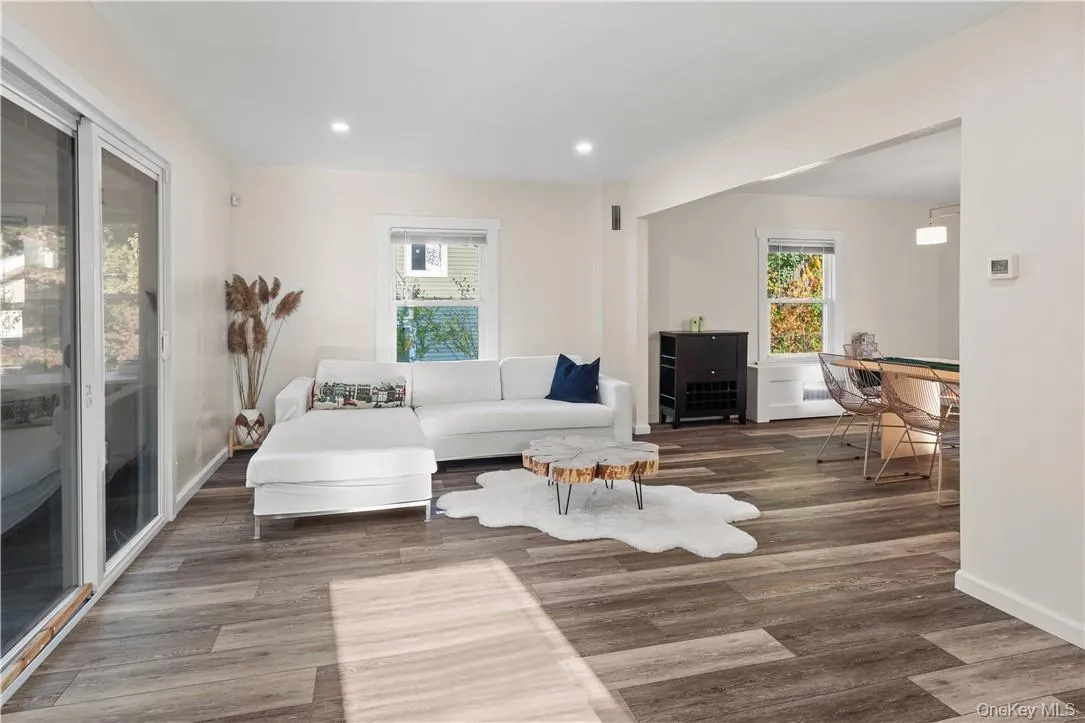 Living room with hardwood / wood-style floors Living room with hardwood / wood-style floors