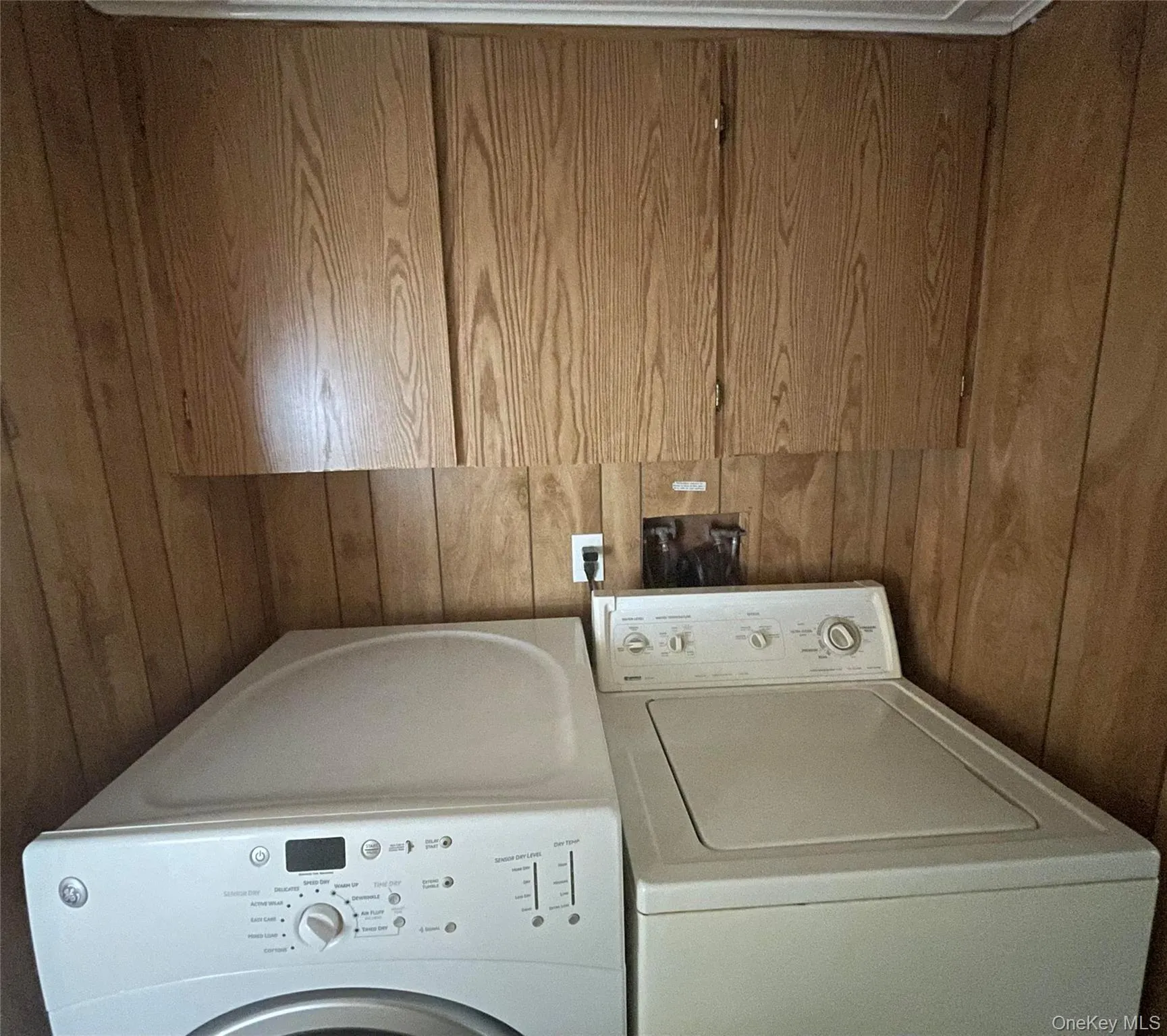 Washer and Dryer with Cabinets Above Washer and Dryer with Cabinets Above
