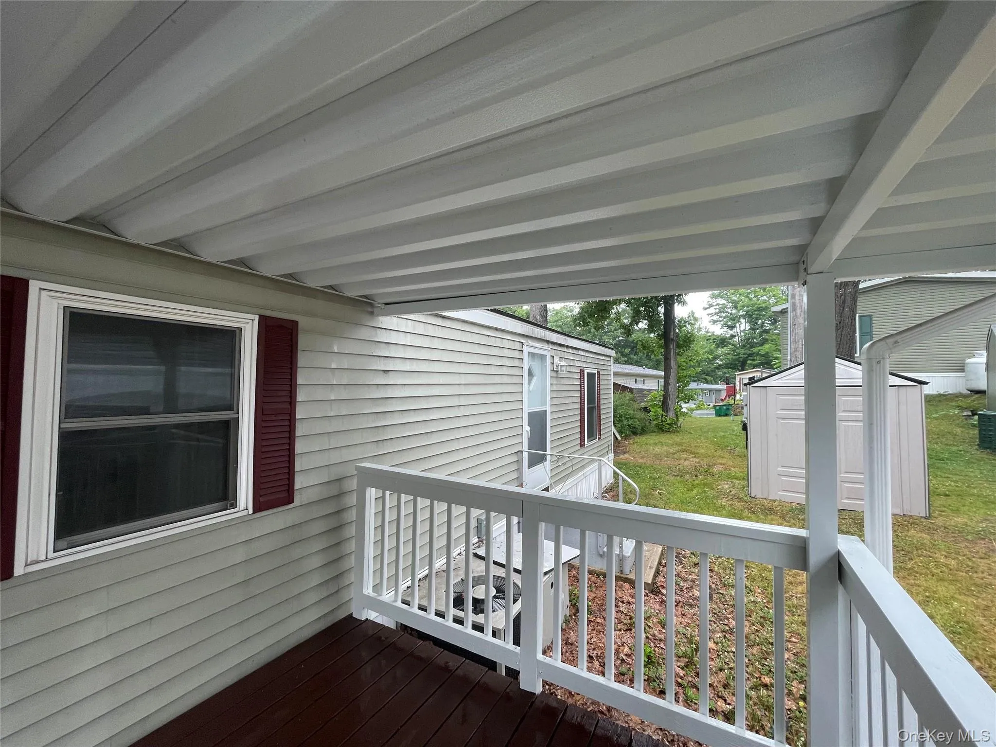 Porch with Shed in Yard Porch with Shed in Yard
