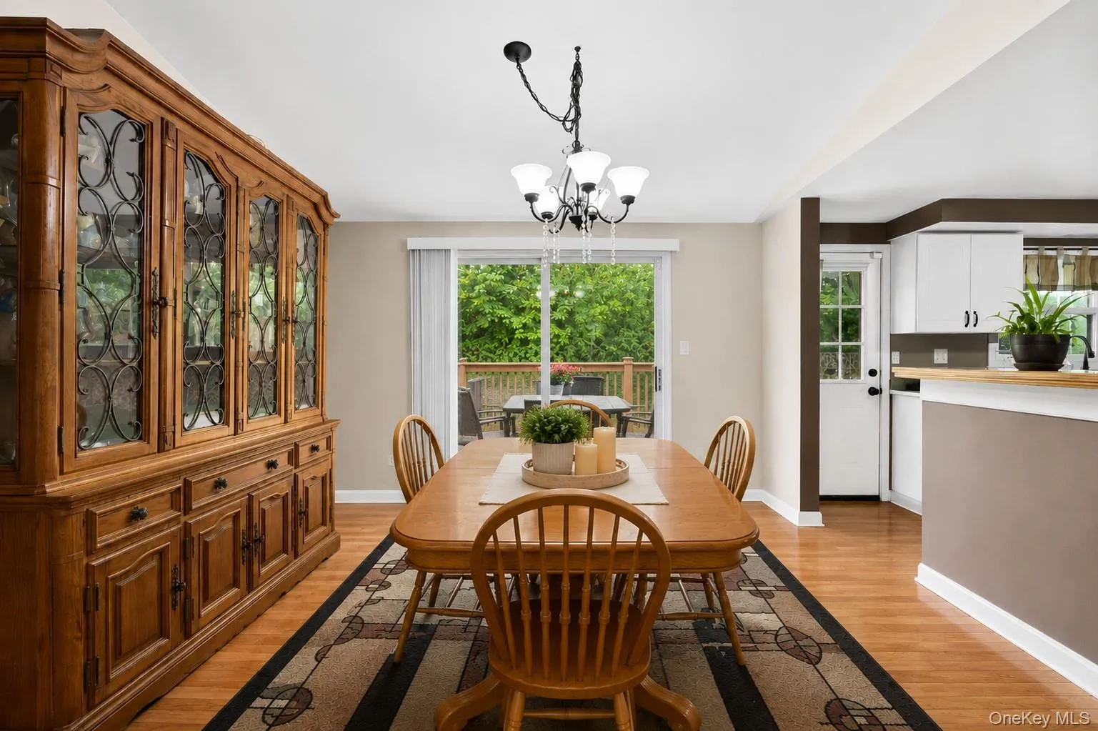 Dining Room w/ sliders out to deck Dining Room w/ sliders out to deck