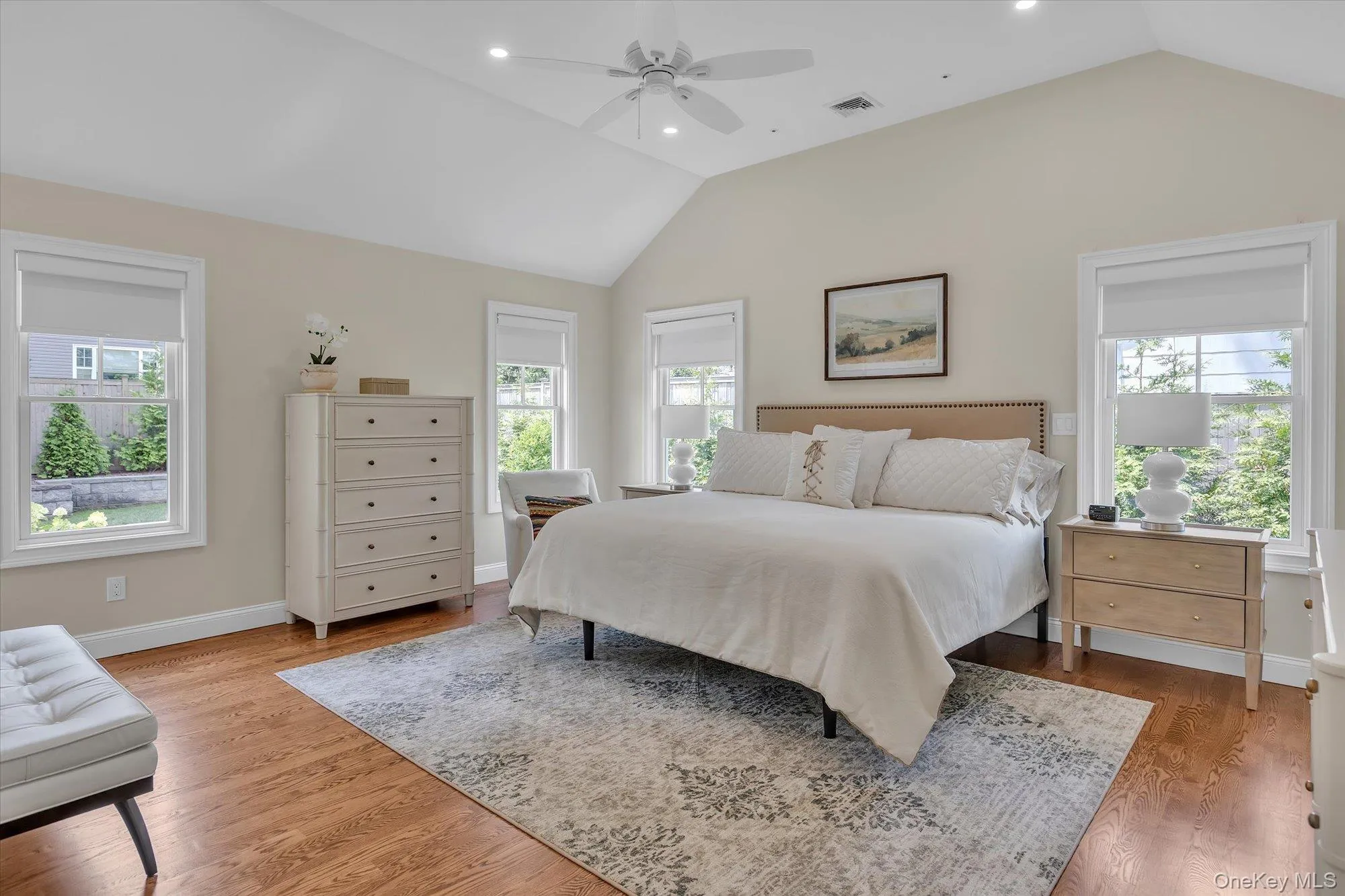 Sun-Filled Vaulted Primary Bedroom With Walk-in Closet & Staircase to Additional Storage Complete with Heat & CAC. Sun-Filled Vaulted Primary Bedroom With Walk-in Closet & Staircase to Additional Storage Complete with Heat & CAC.
