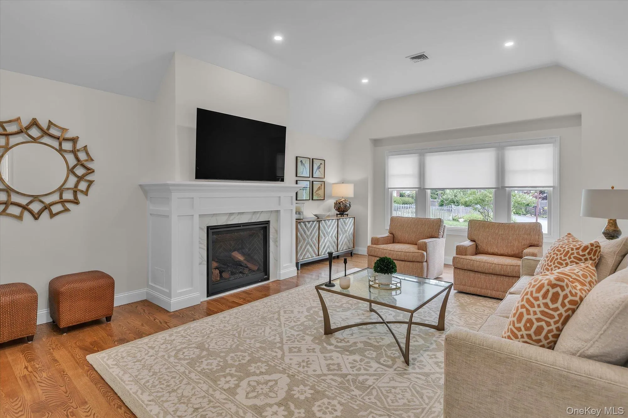 Red Oak Floors throughout the Home. Vaulted Great Room With Gas Fireplace Red Oak Floors throughout the Home. Vaulted Great Room With Gas Fireplace