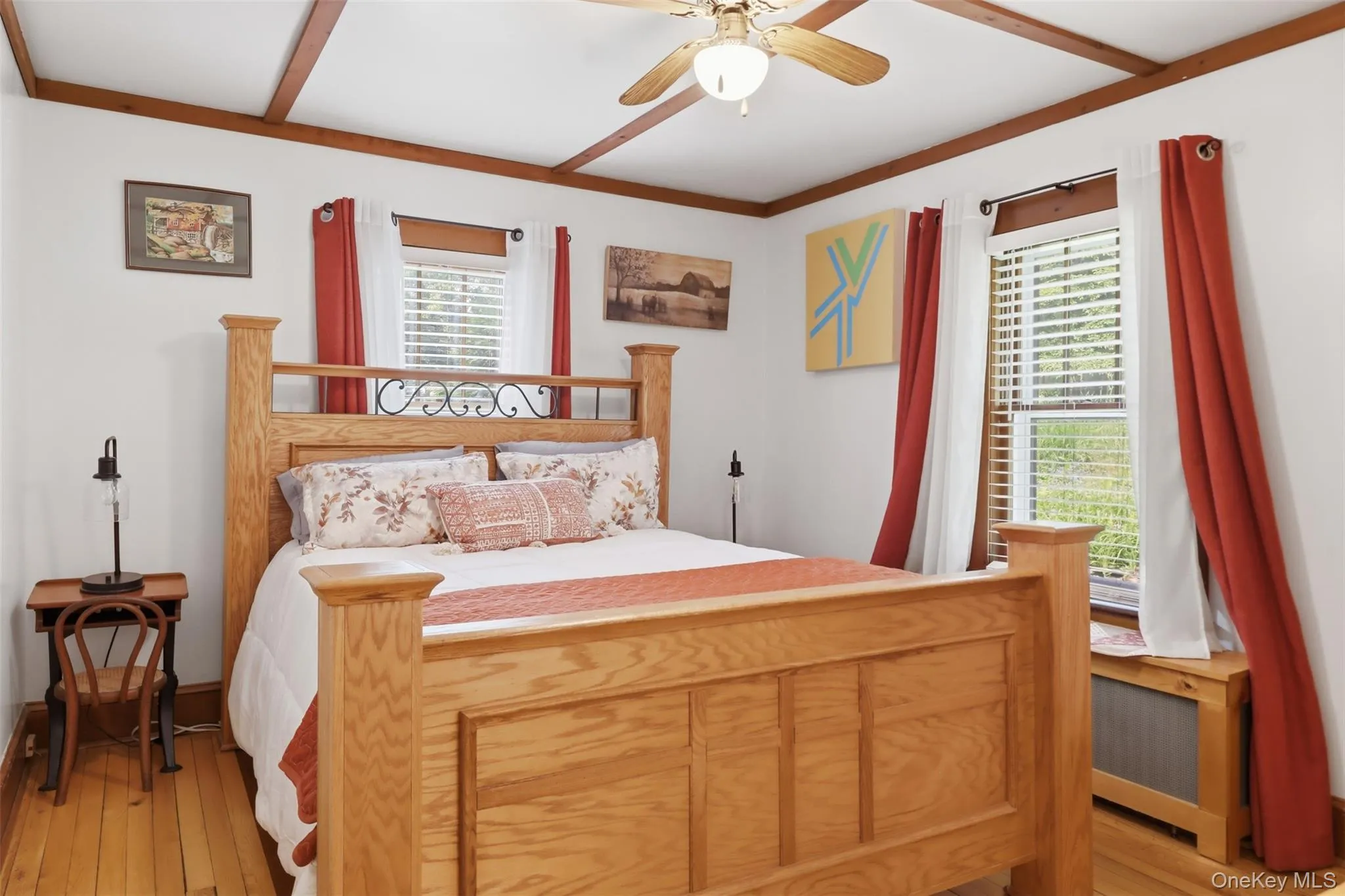 1st floor bedroom with hardwood floors and closet 1st floor bedroom with hardwood floors and closet
