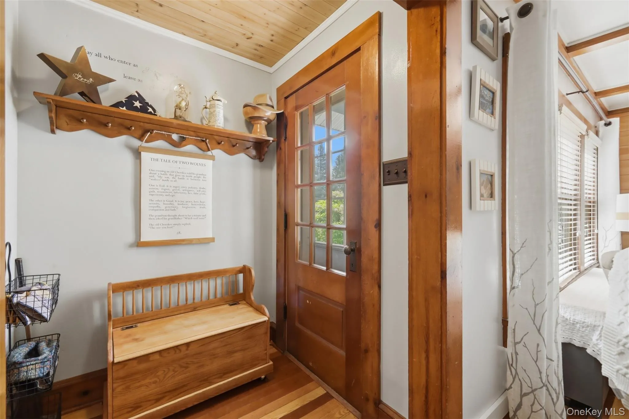 Two entries into the home. The front door offers a bluestone front patio. Stunning wood details throughout. Two entries into the home. The front door offers a bluestone front patio. Stunning wood details throughout.