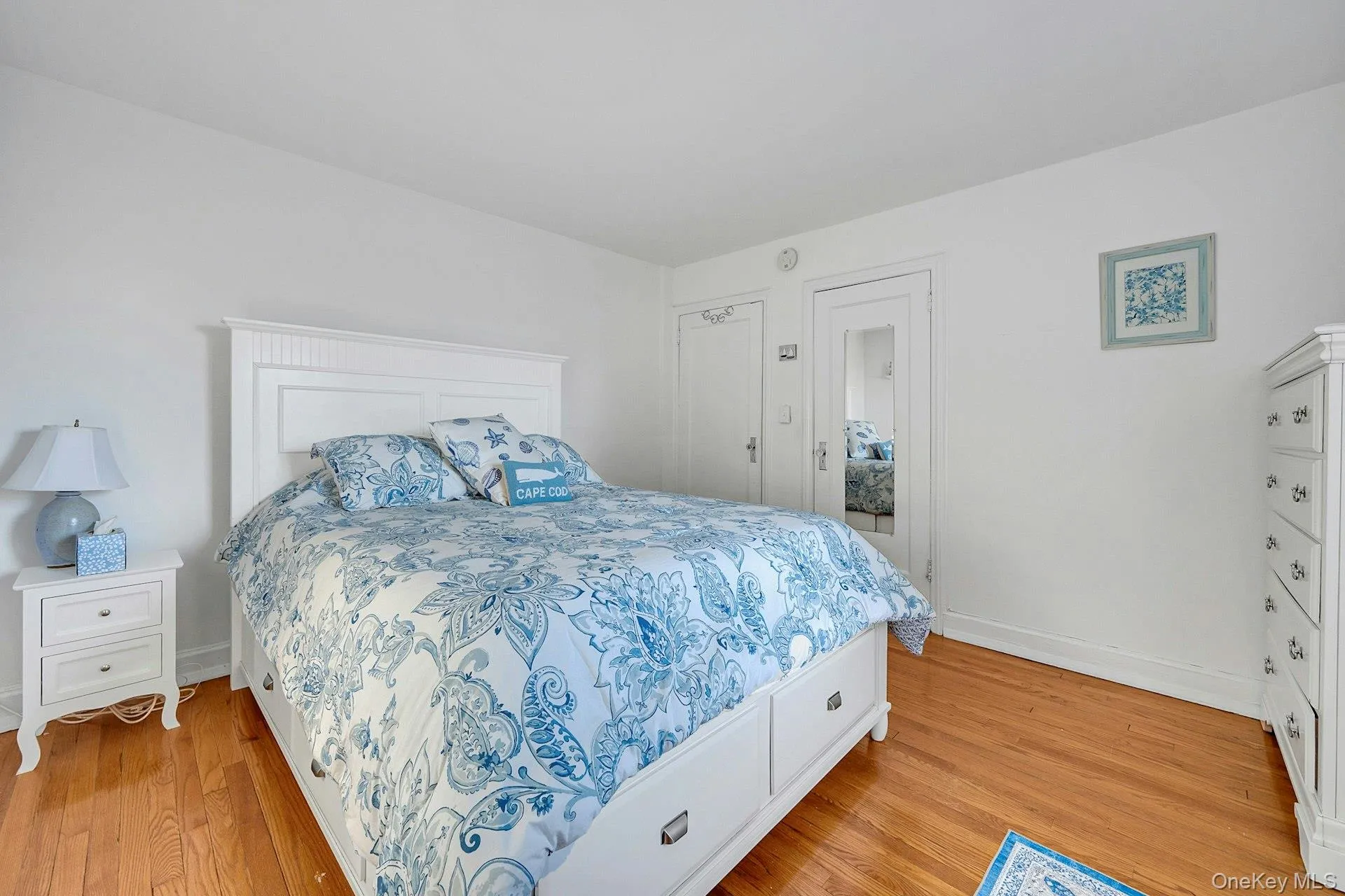 Primary bedroom with hardwood floors Primary bedroom with hardwood floors