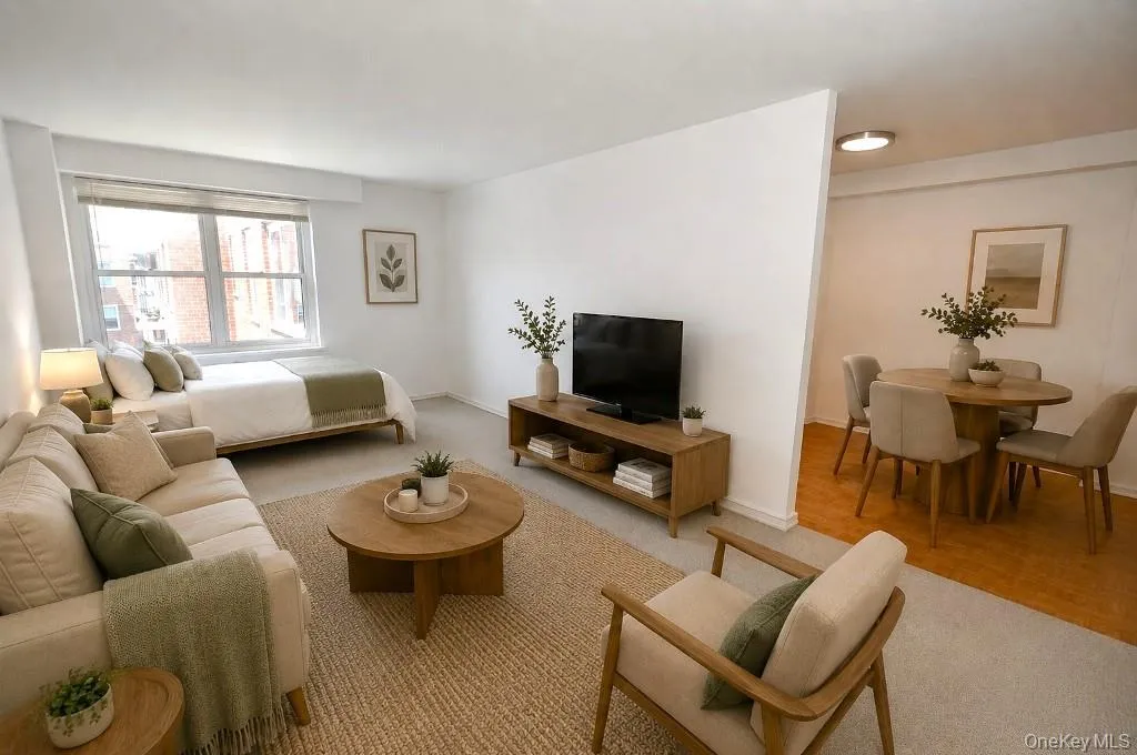 Photo Visually Staged The living room has covered parquet floors, Western exposures. The living area is approx. 20'-11" x 11'-7" Photo Visually Staged The living room has covered parquet floors, Western exposures. The living area is approx. 20'-11" x 11'-7"