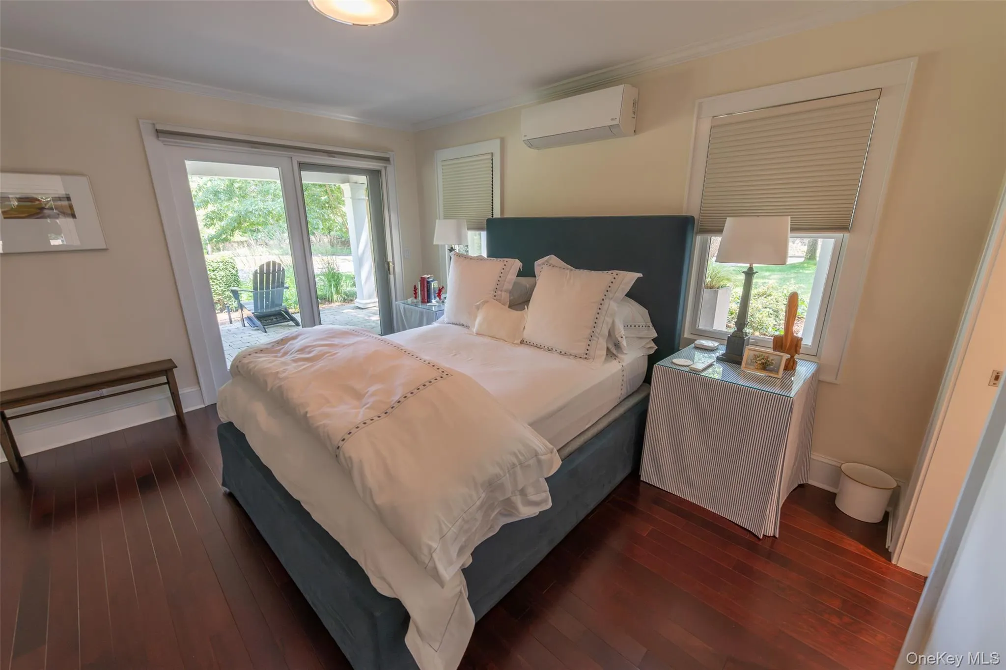 Rich wood-finish flooring complements the neutral wall tones Rich wood-finish flooring complements the neutral wall tones