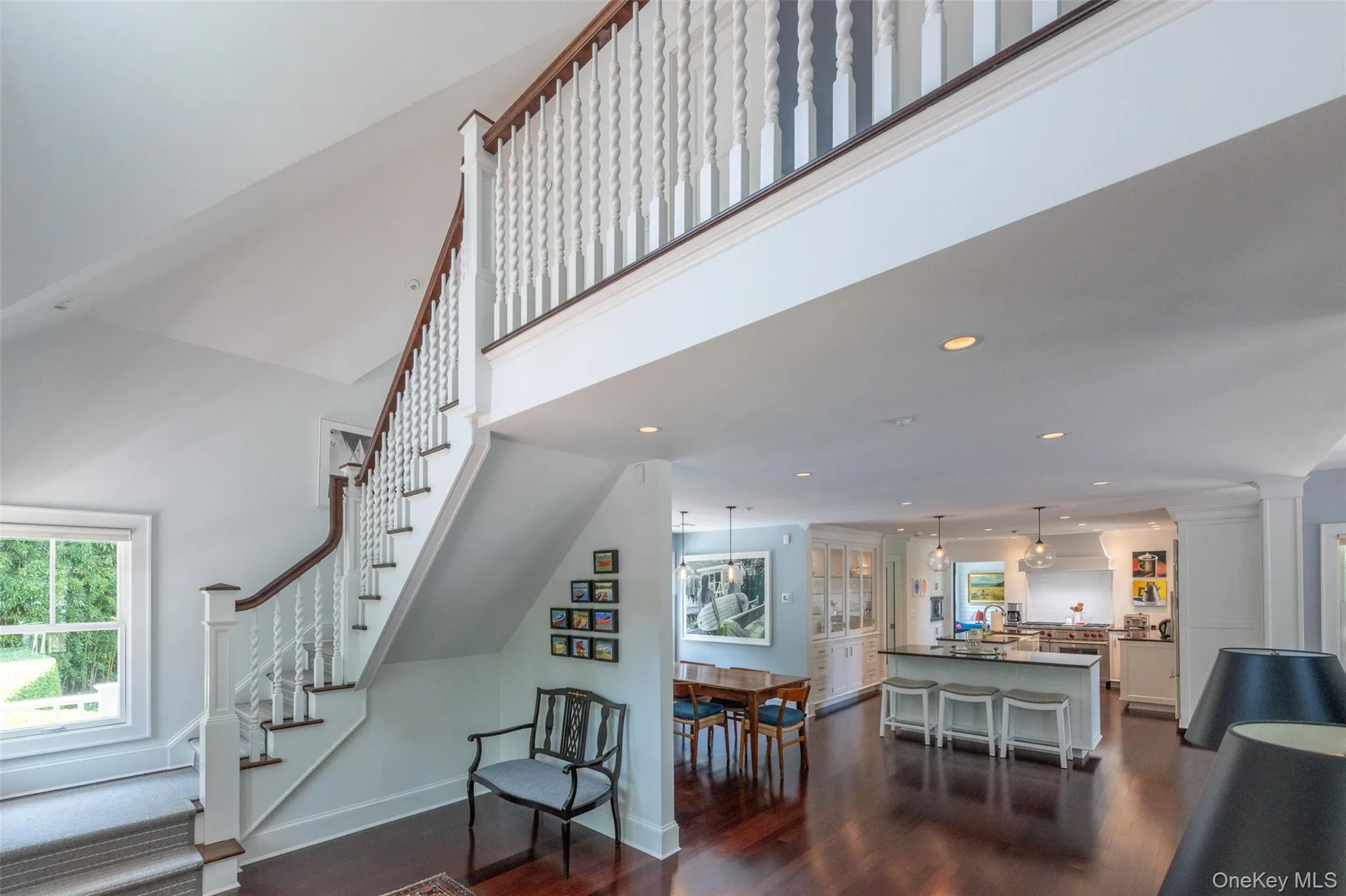 Grand entry over looking open concept living spaces Grand entry over looking open concept living spaces
