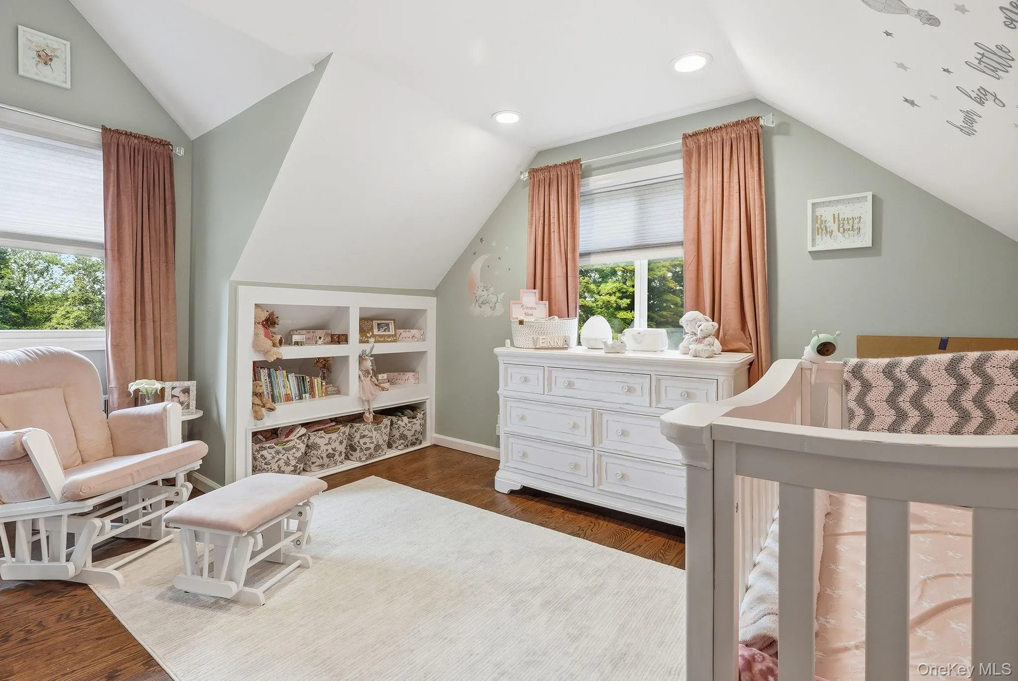 Room featuring hardwood flooring and light gray walls Room featuring hardwood flooring and light gray walls