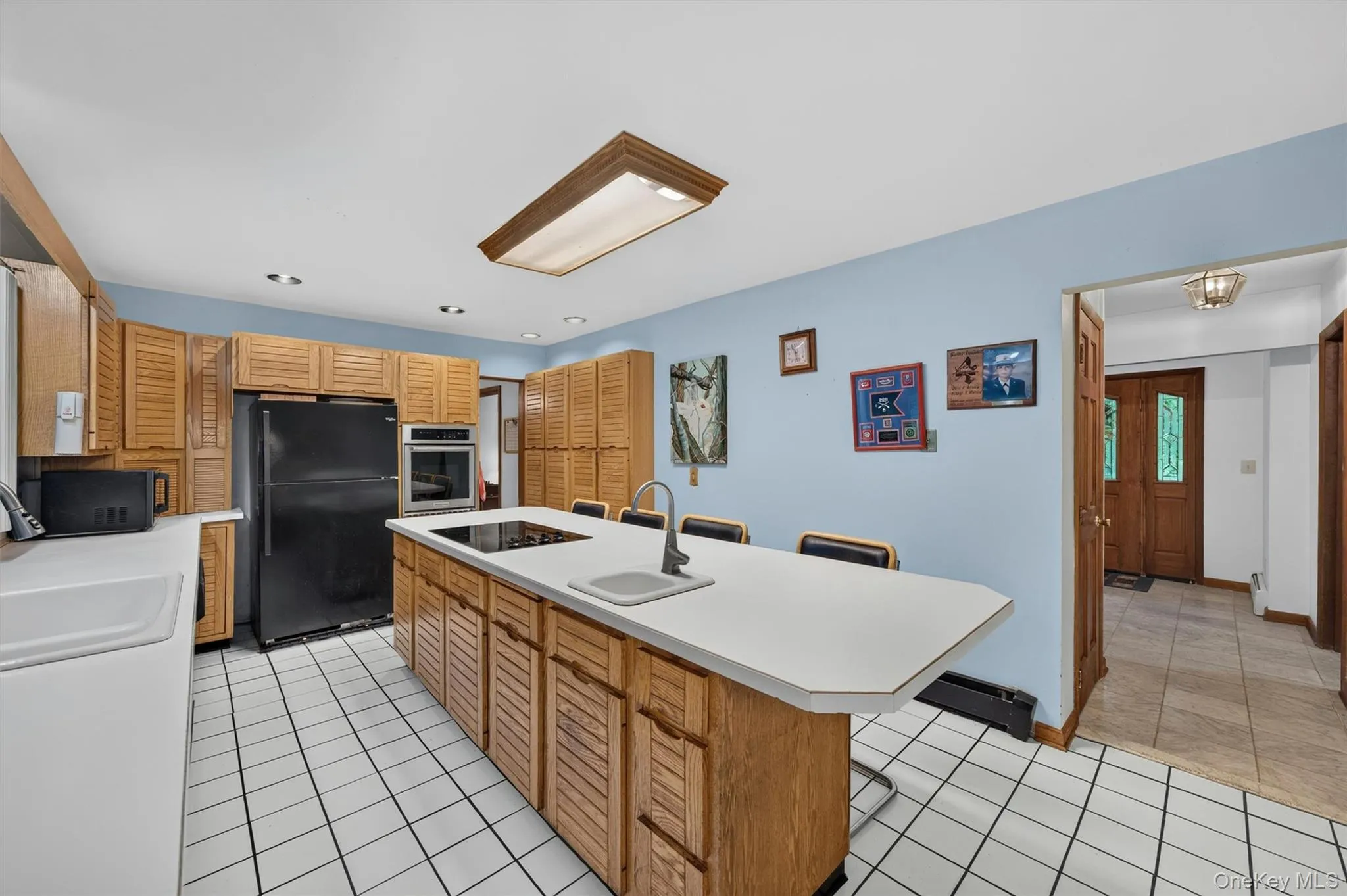 Enter the kitchen from either the front hall or the dining room. Enter the kitchen from either the front hall or the dining room.
