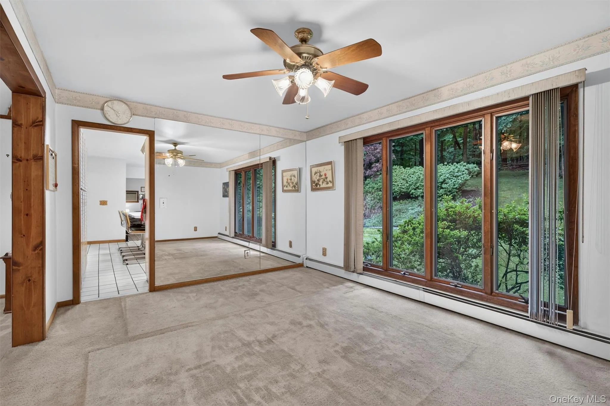 The dining room has a wall of windows so you can enjoy the property inside. The dining room has a wall of windows so you can enjoy the property inside.