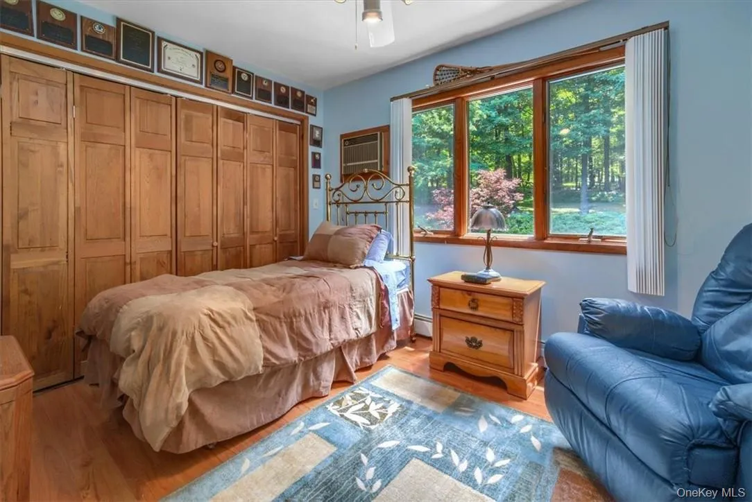 Another bedroom with a full wall of closet space. This home does not lack storage space. Another bedroom with a full wall of closet space. This home does not lack storage space.