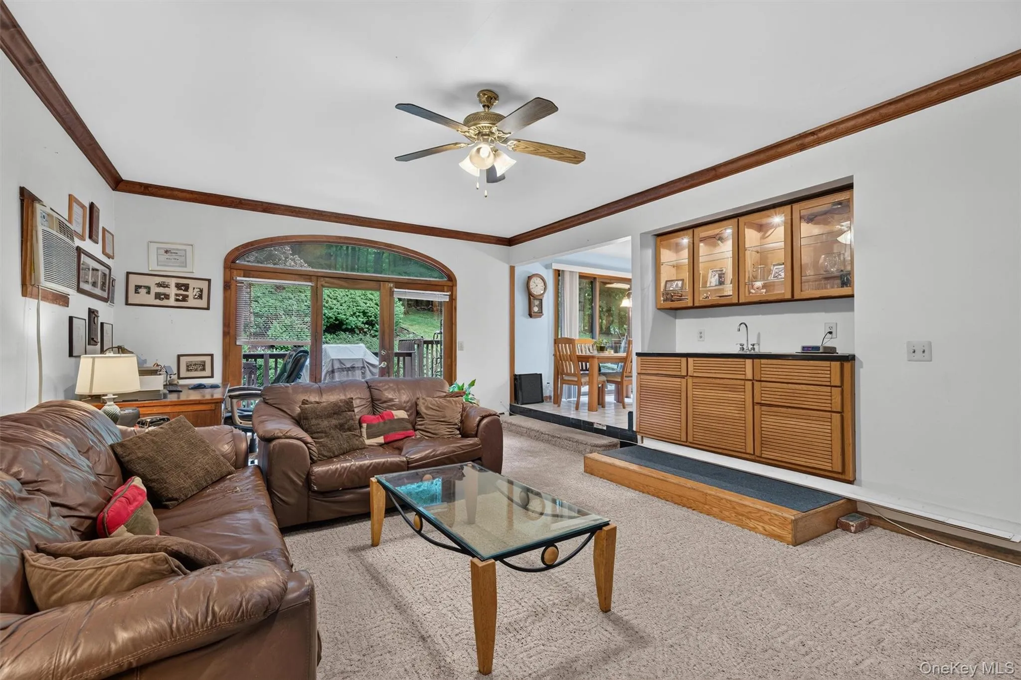 Notice the wood trim and molding . Notice the wood trim and molding .