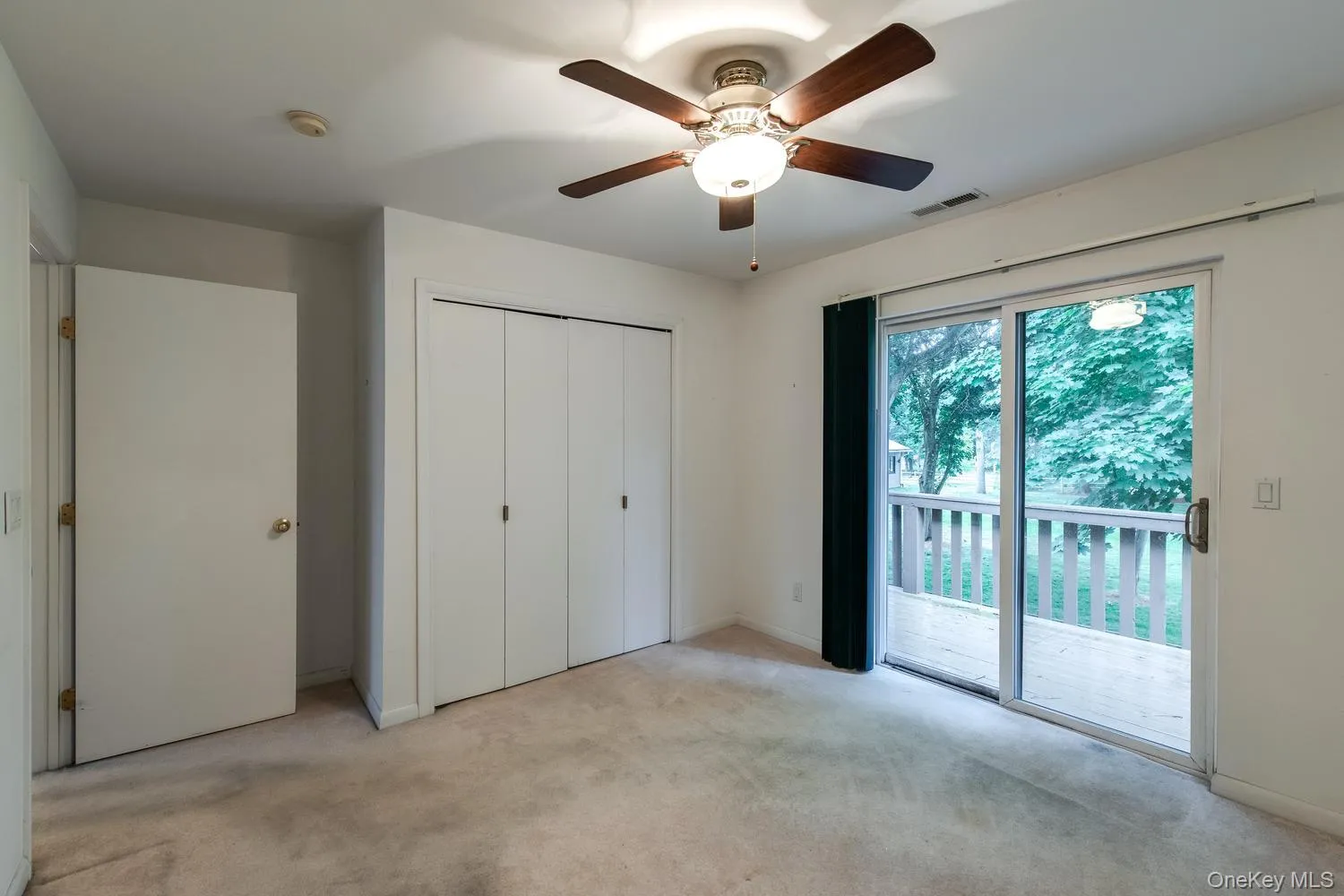 Large closet, sliding glass doors to balcony Large closet, sliding glass doors to balcony