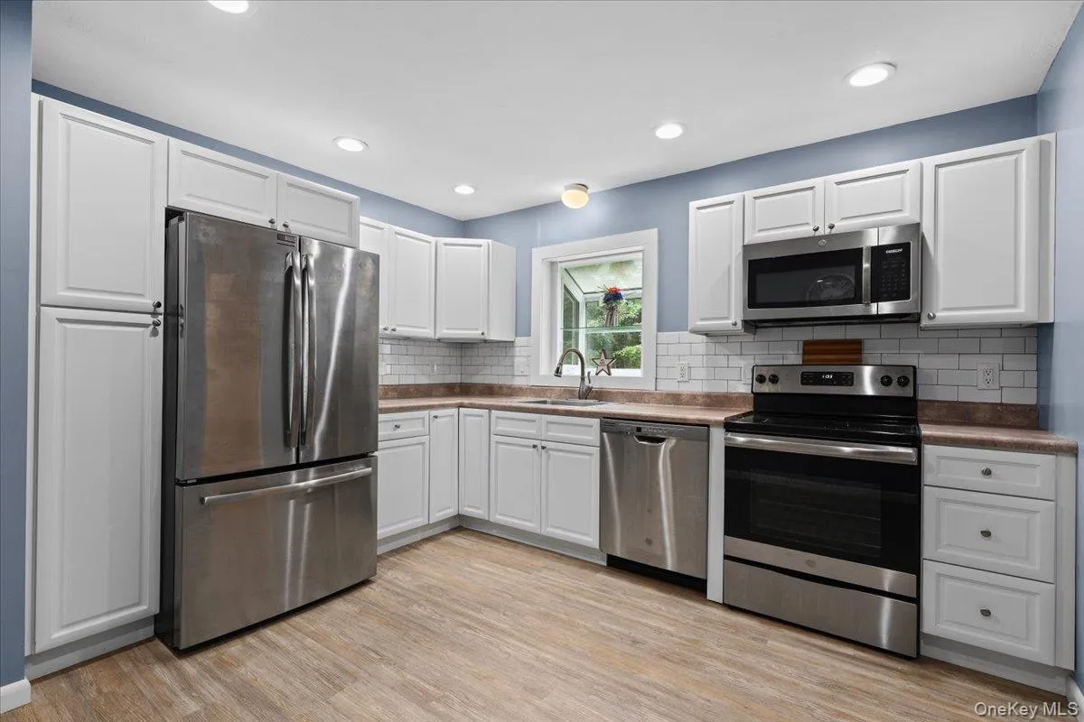 Updated Kitchen featuring Stainless Steel appliances Updated Kitchen featuring Stainless Steel appliances