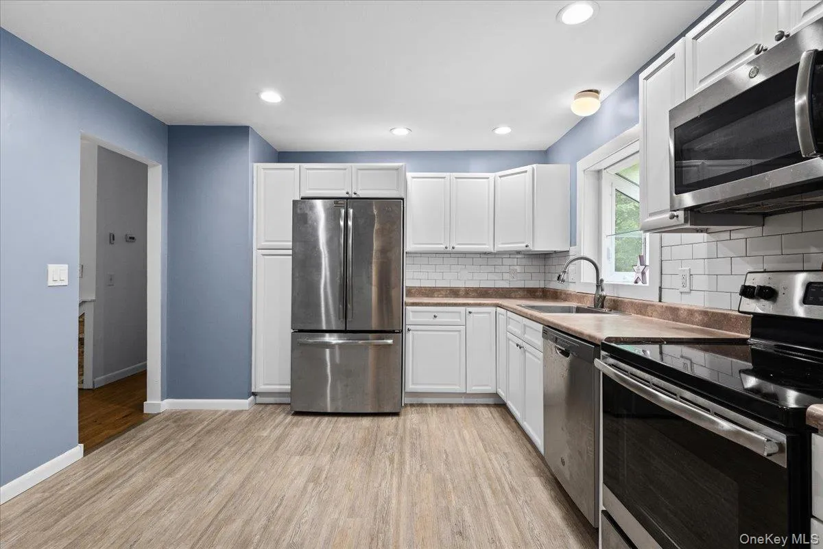 Updated Kitchen featuring Stainless Steel appliances Updated Kitchen featuring Stainless Steel appliances