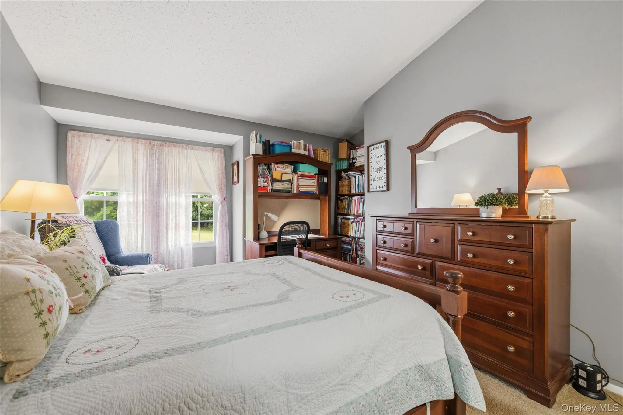 Bedroom with high ceilings, and a large walk-in custom closet Bedroom with high ceilings, and a large walk-in custom closet