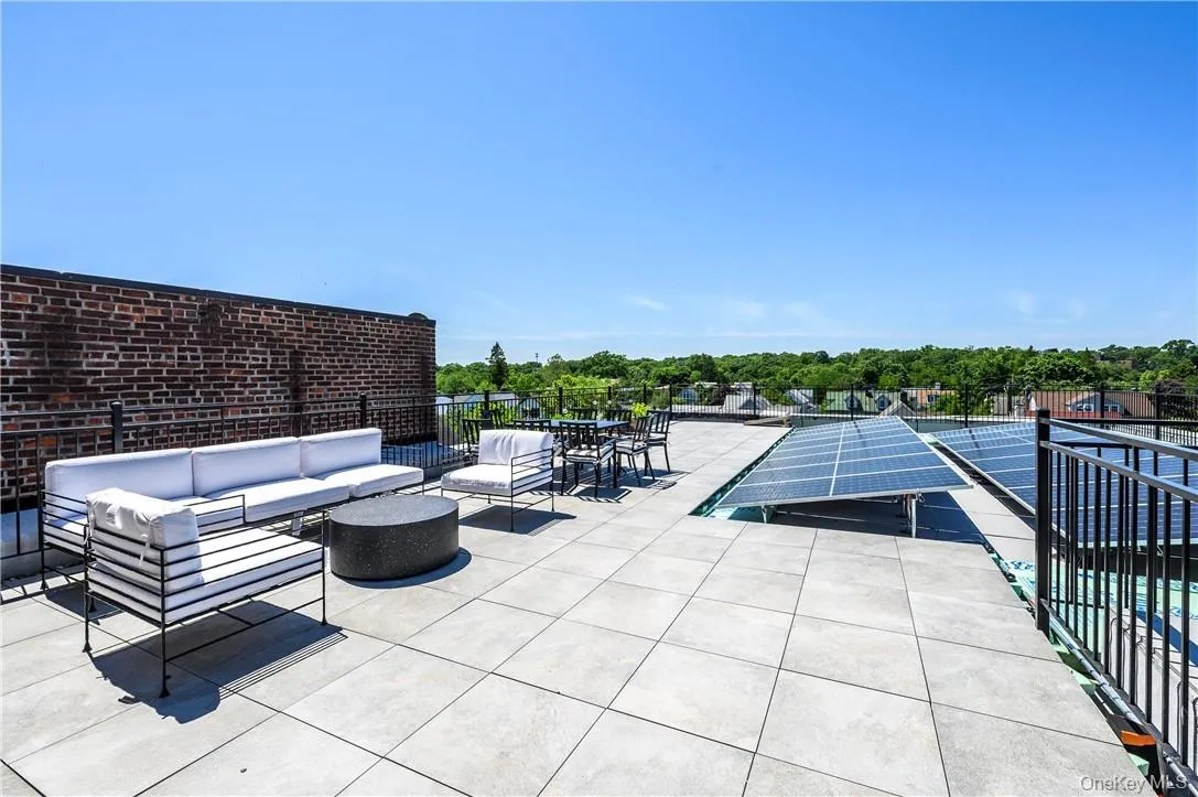 View of patio / terrace with an outdoor living space View of patio / terrace with an outdoor living space
