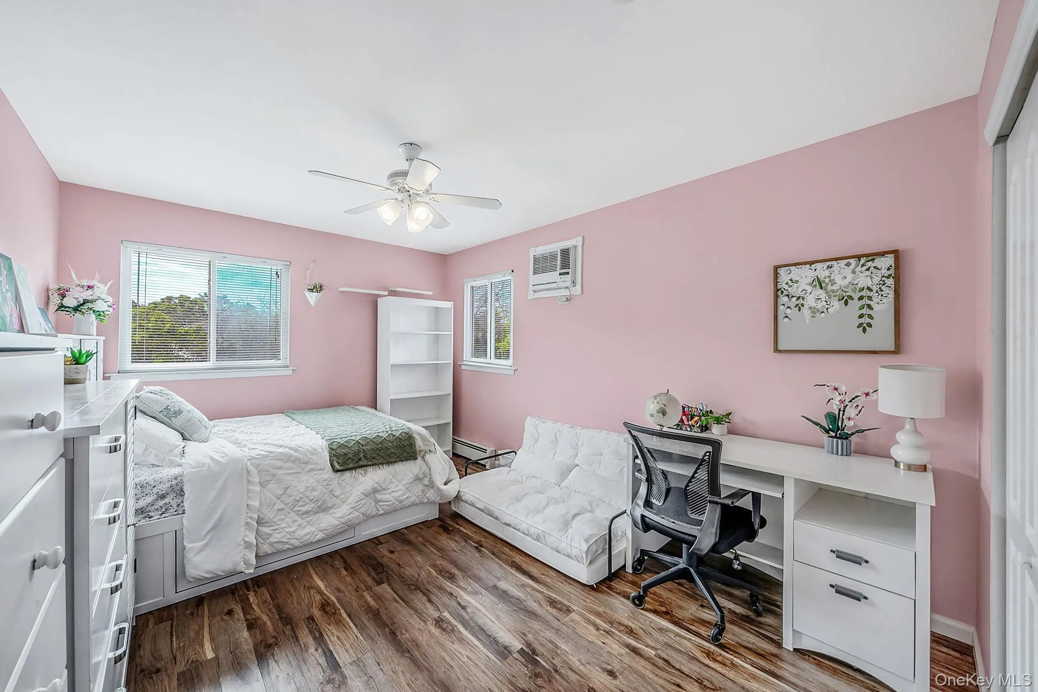Spacious 2nd floor bedroom room w/ large closet. Featuring natural light, and a ceiling fan. Spacious 2nd floor bedroom room w/ large closet. Featuring natural light, and a ceiling fan.