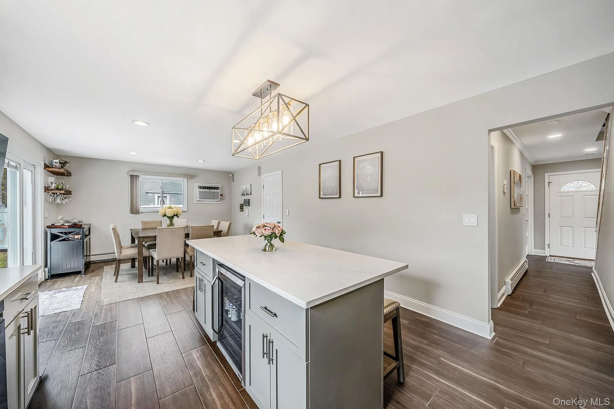 Spacious inviting open floorplan. Porcelain tile wood finish flooring. Heart of the home. Spacious inviting open floorplan. Porcelain tile wood finish flooring. Heart of the home.