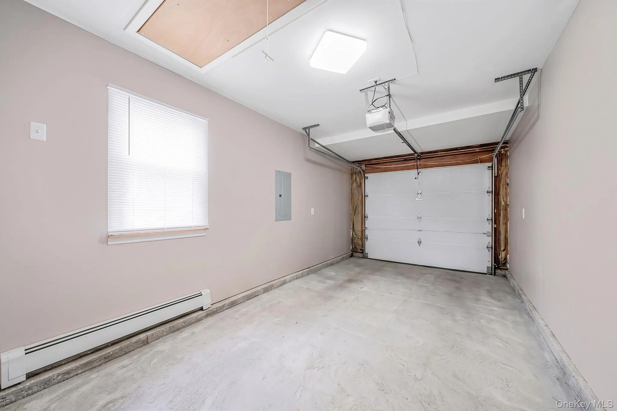One car garage, storage, heating utilities access, pull down partial attic access, automatic garage door opener, 150 amp service panel, Base board heat. One car garage, storage, heating utilities access, pull down partial attic access, automatic garage door opener, 150 amp service panel, Base board heat.