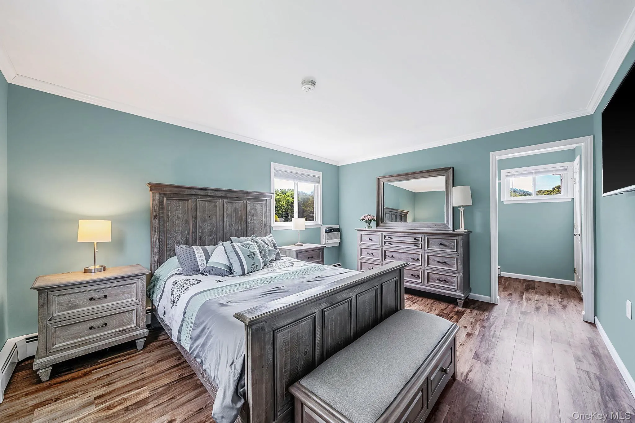 Spacious primary bedroom featuring a tremendous walk-in closet. Spacious primary bedroom featuring a tremendous walk-in closet.