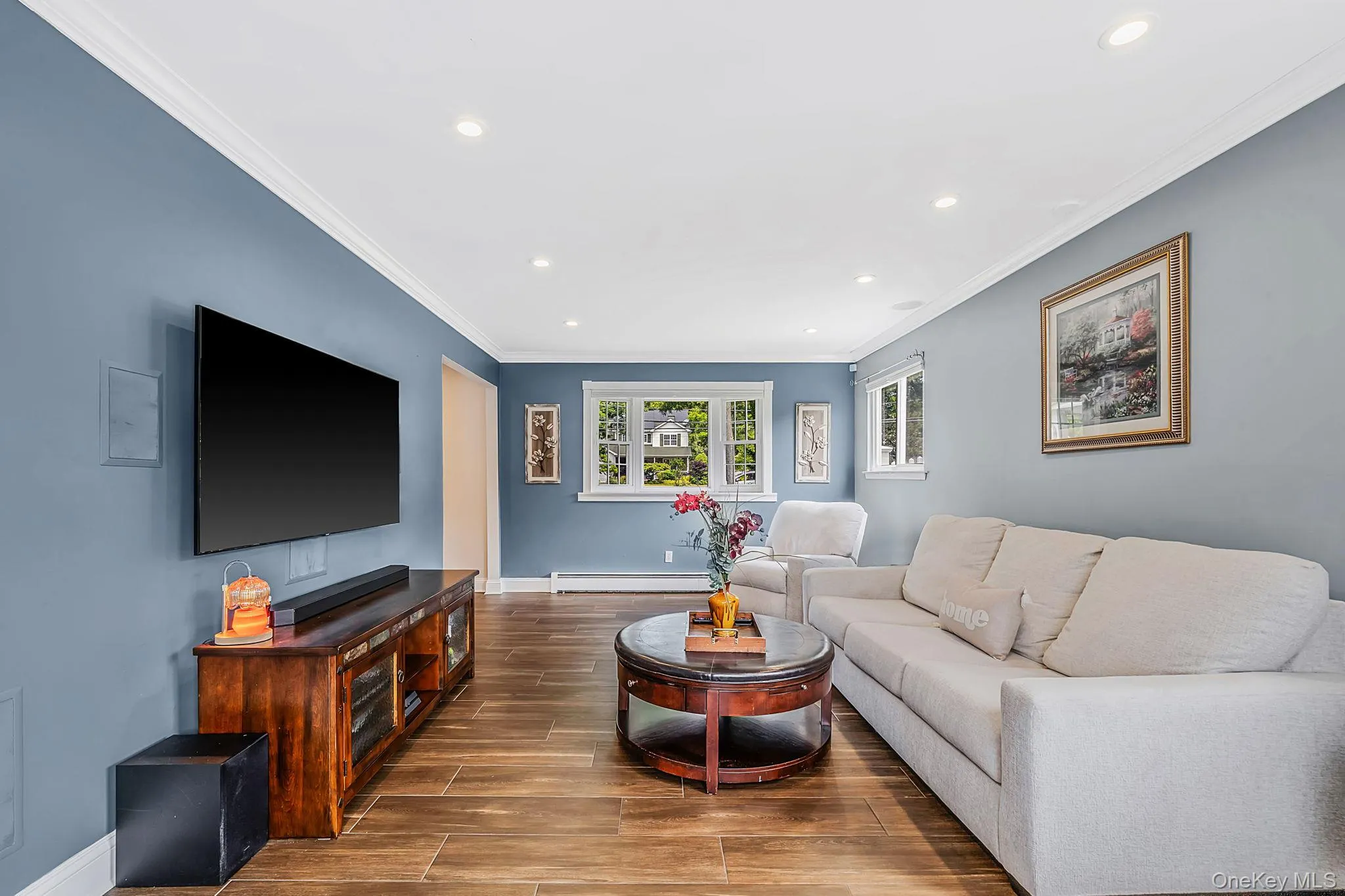 Large front bay window, crown molding throughout. Family movie/game nights, making forever memories. Large front bay window, crown molding throughout. Family movie/game nights, making forever memories.