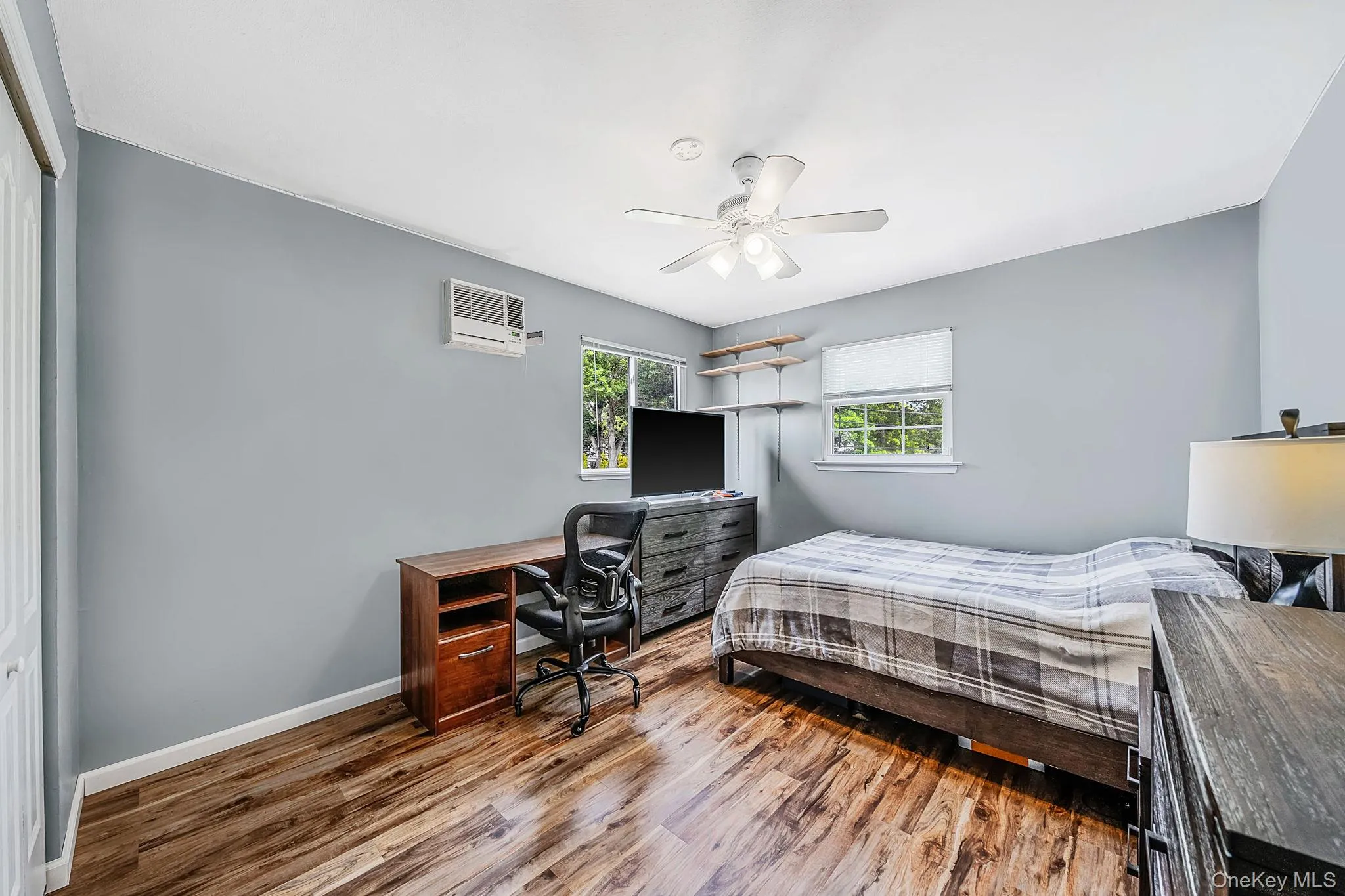 2nd floor spacious bedroom. Featuring a large closet, natural light, and a ceiling fan. 2nd floor spacious bedroom. Featuring a large closet, natural light, and a ceiling fan.