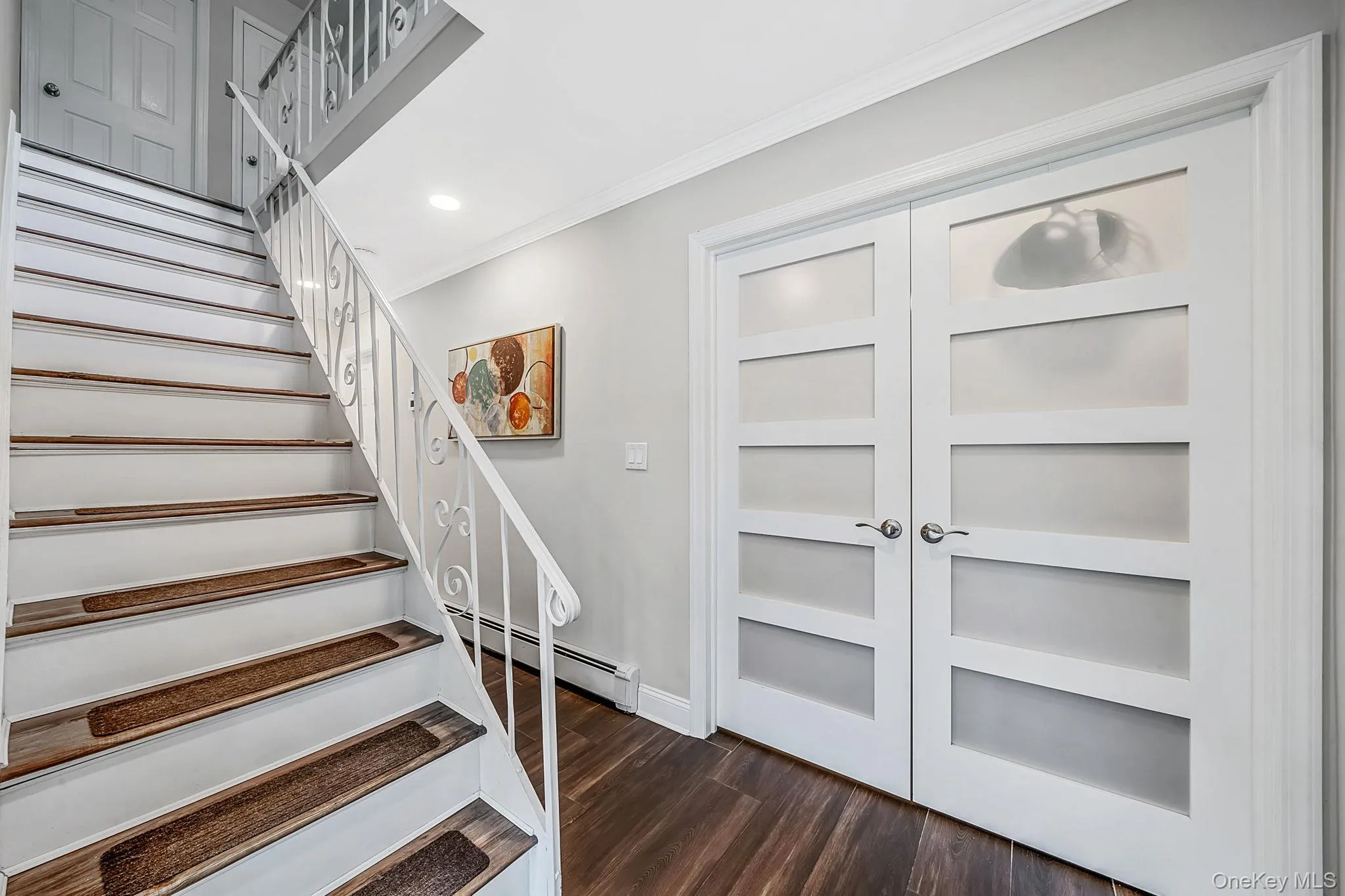 Welcoming spacious; bright entry foyer. Classic etched French door w/brushed nickel hardware. Welcoming spacious; bright entry foyer. Classic etched French door w/brushed nickel hardware.