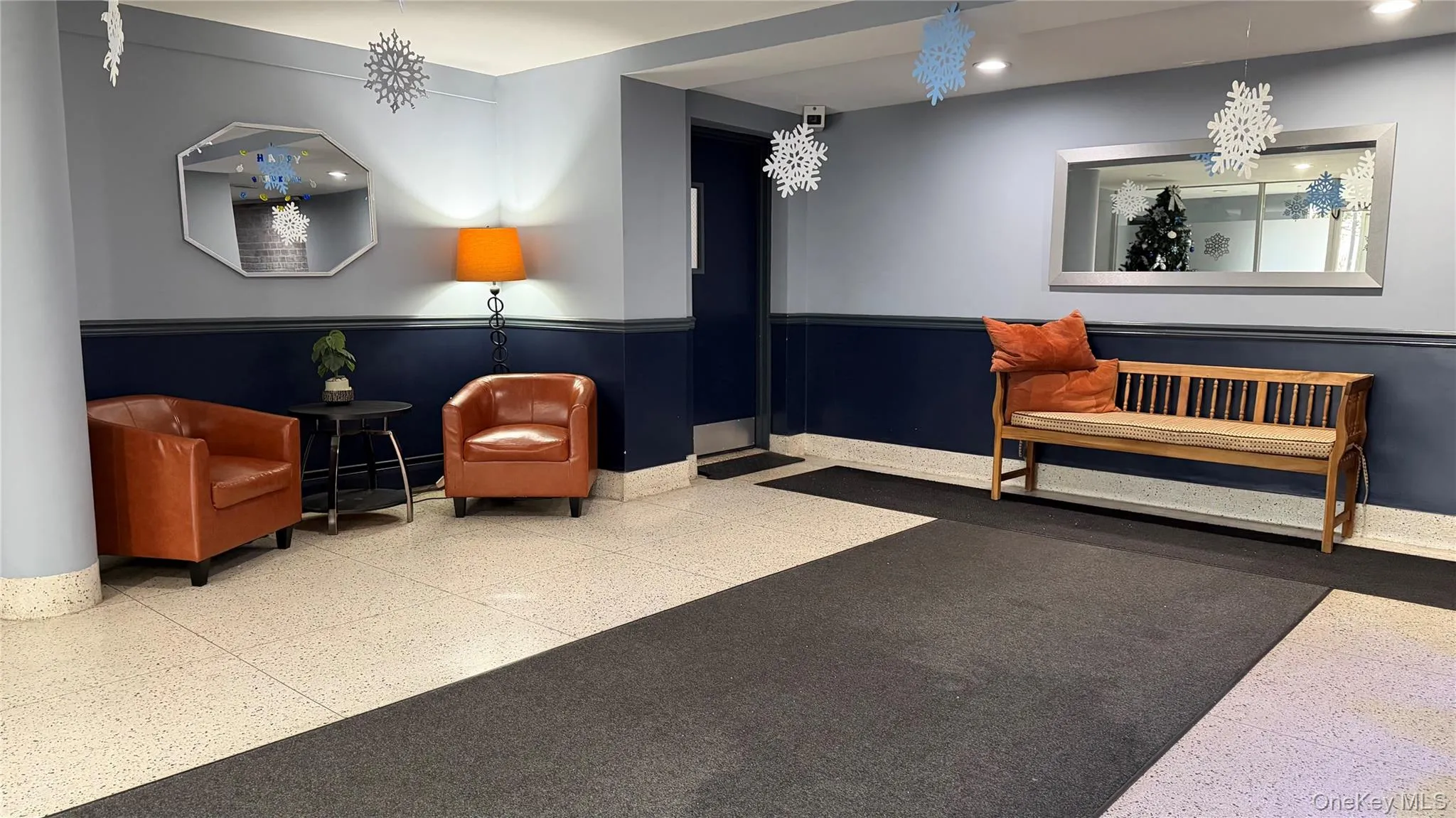 Common area with wainscoting and recessed lighting Common area with wainscoting and recessed lighting