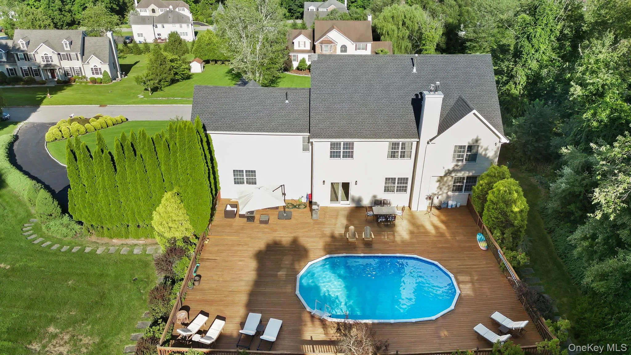 Custom built 48 x 60 deck surrounding the pool Custom built 48 x 60 deck surrounding the pool