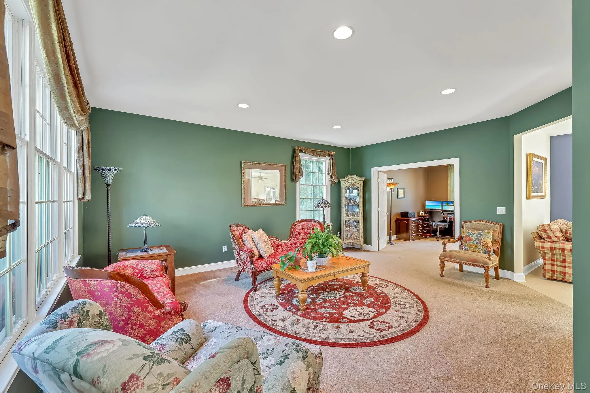 Formal Living Room leads to double french doors into a private home office. Formal Living Room leads to double french doors into a private home office.