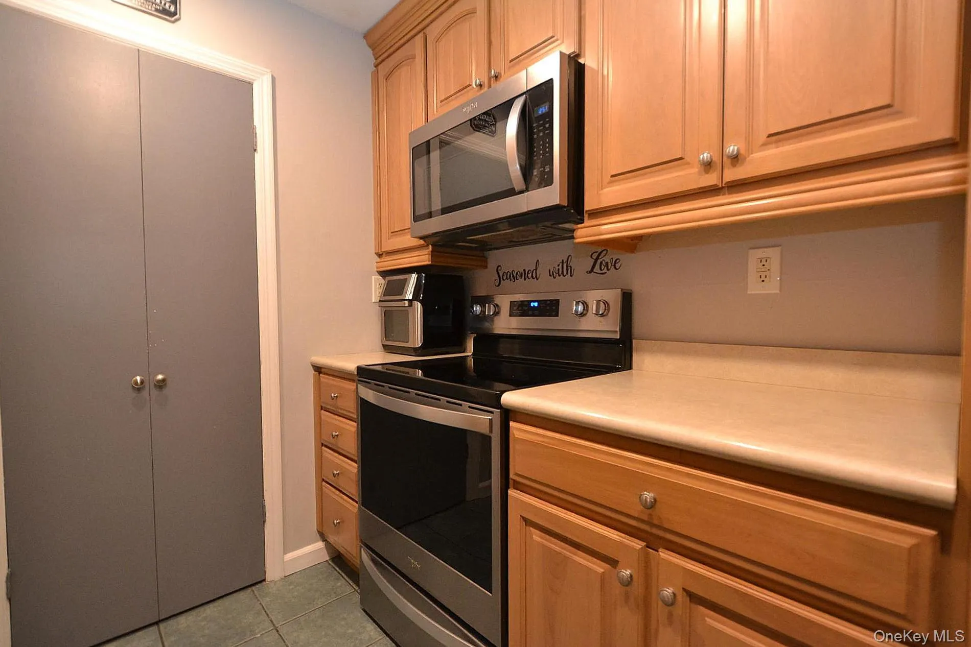 Stainless Steel Stove and Microwave, counter space Stainless Steel Stove and Microwave, counter space