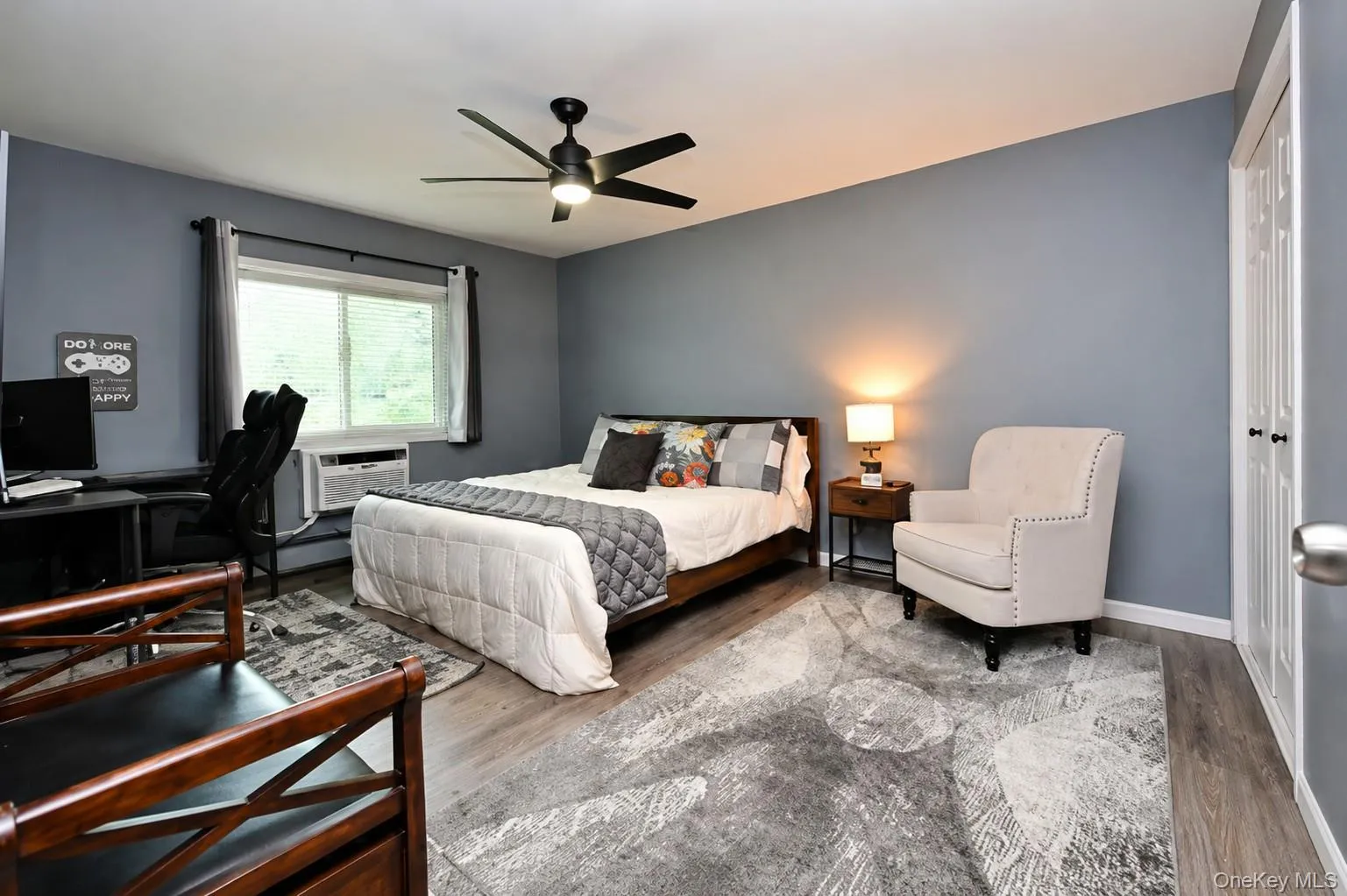 Large primary bedroom with 2 closets on the entire wall Large primary bedroom with 2 closets on the entire wall
