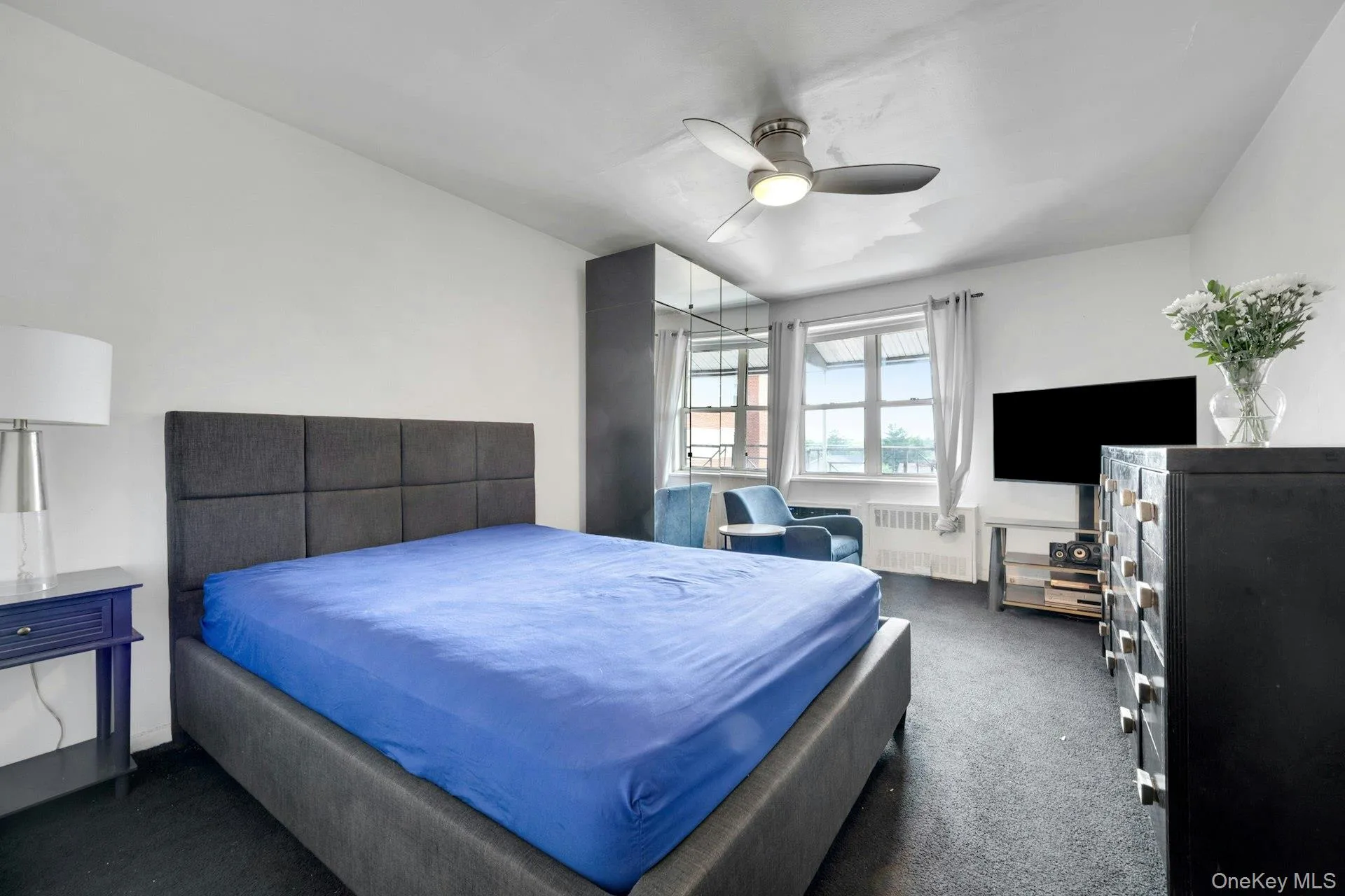 Primary Bedroom with Large Windows Primary Bedroom with Large Windows