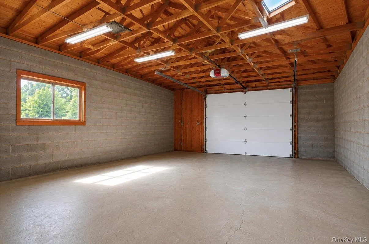 Garage interior, staged to remove personal belongings. Garage interior, staged to remove personal belongings.