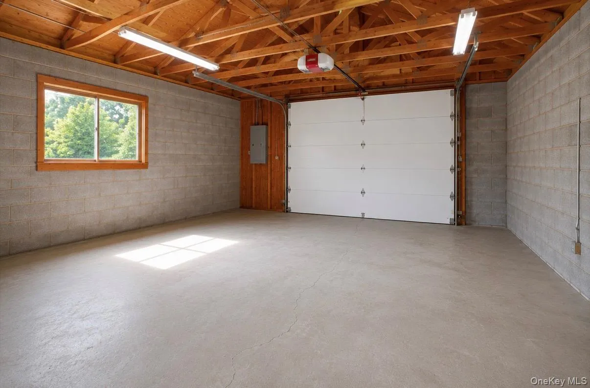 Garage interior, staged to remove personal belongings. Garage interior, staged to remove personal belongings.