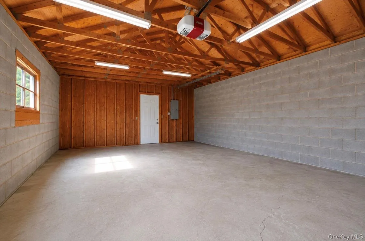 Garage interior, staged to remove personal belongings. Garage interior, staged to remove personal belongings.