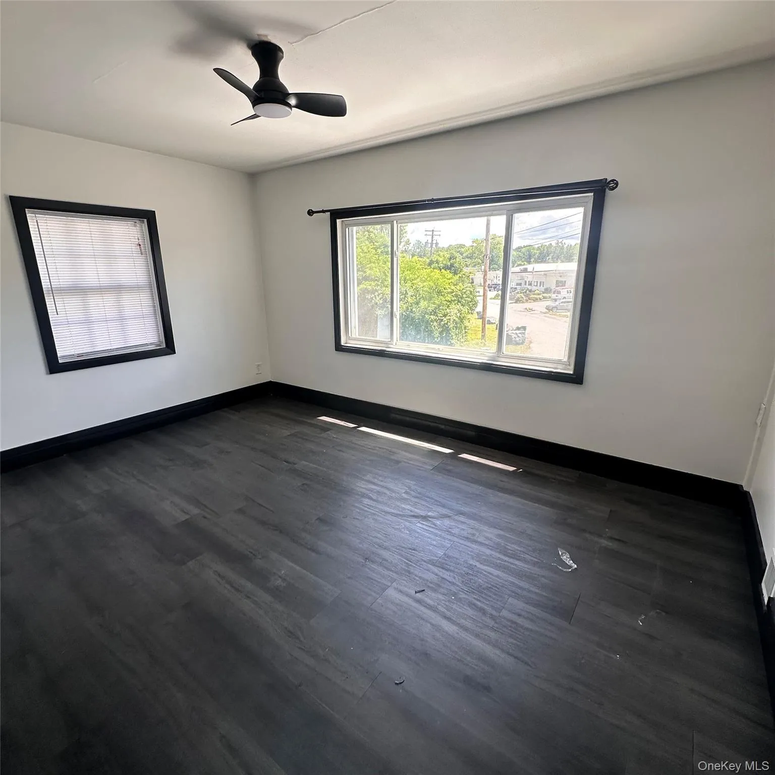 Bedroom. Vinyl flooring, ceiling fan with light, forced air vent. Bedroom. Vinyl flooring, ceiling fan with light, forced air vent.
