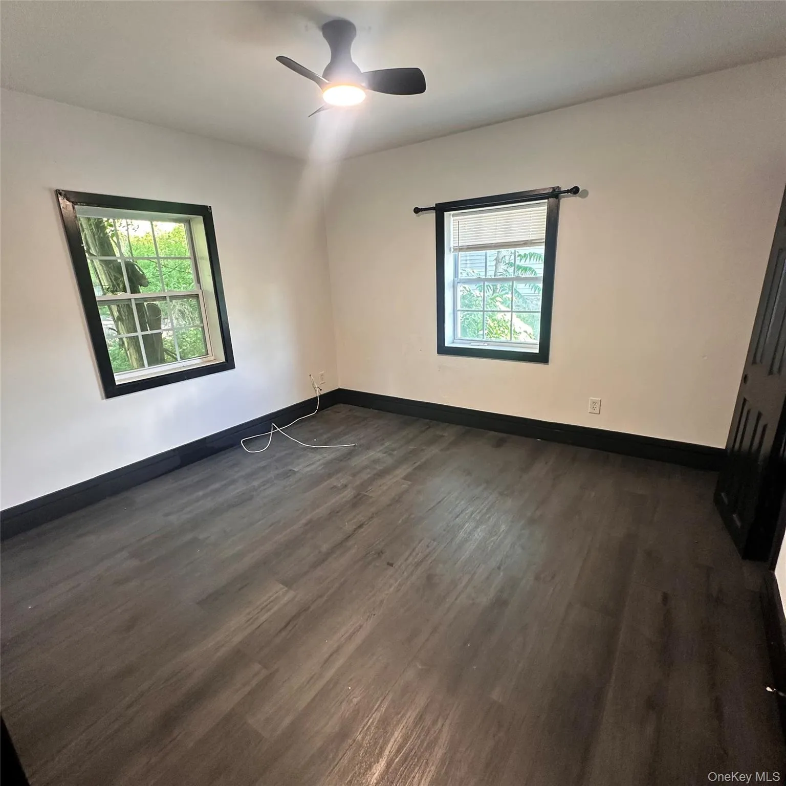 Bedroom. Vinyl flooring, ceiling fan with light, forced air vent. Bedroom. Vinyl flooring, ceiling fan with light, forced air vent.