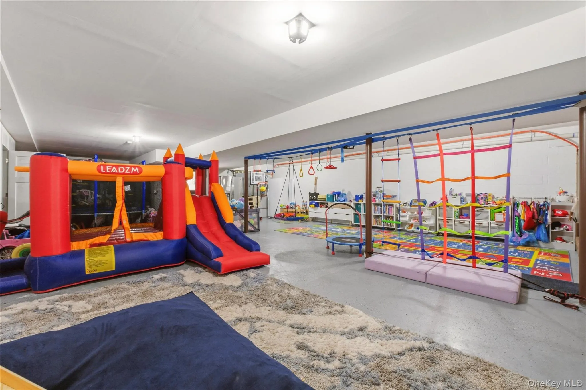 This vibrant indoor playroom is the perfect space for active play, creativity, and year-round entertainment. This vibrant indoor playroom is the perfect space for active play, creativity, and year-round entertainment.