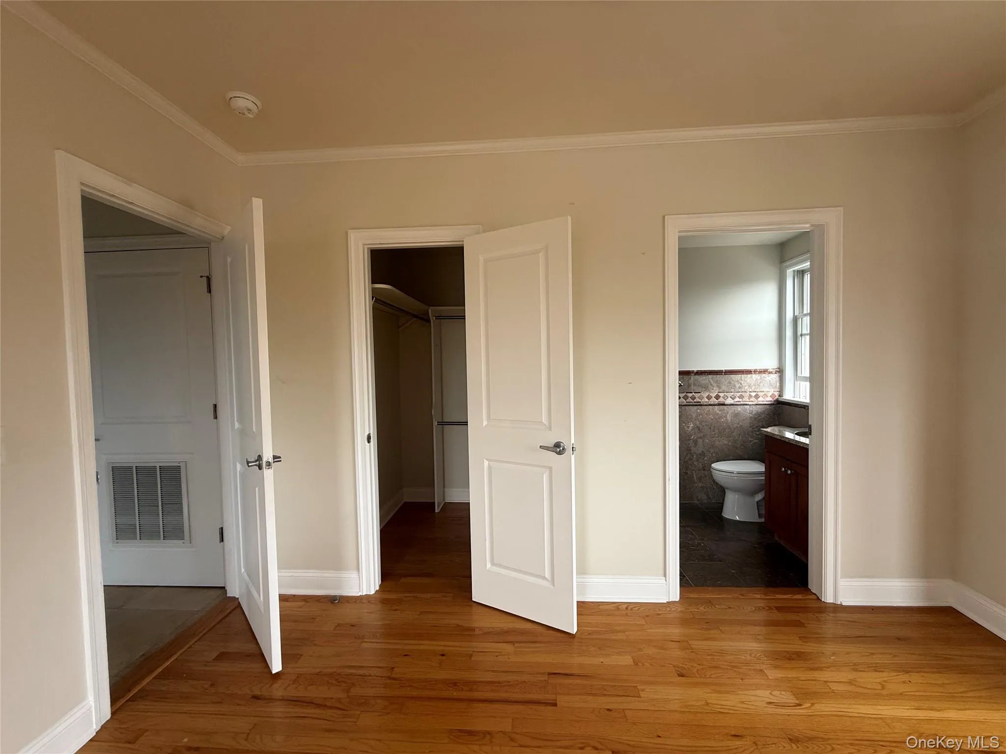 Bedroom door, walk in closet and bathroom Bedroom door, walk in closet and bathroom