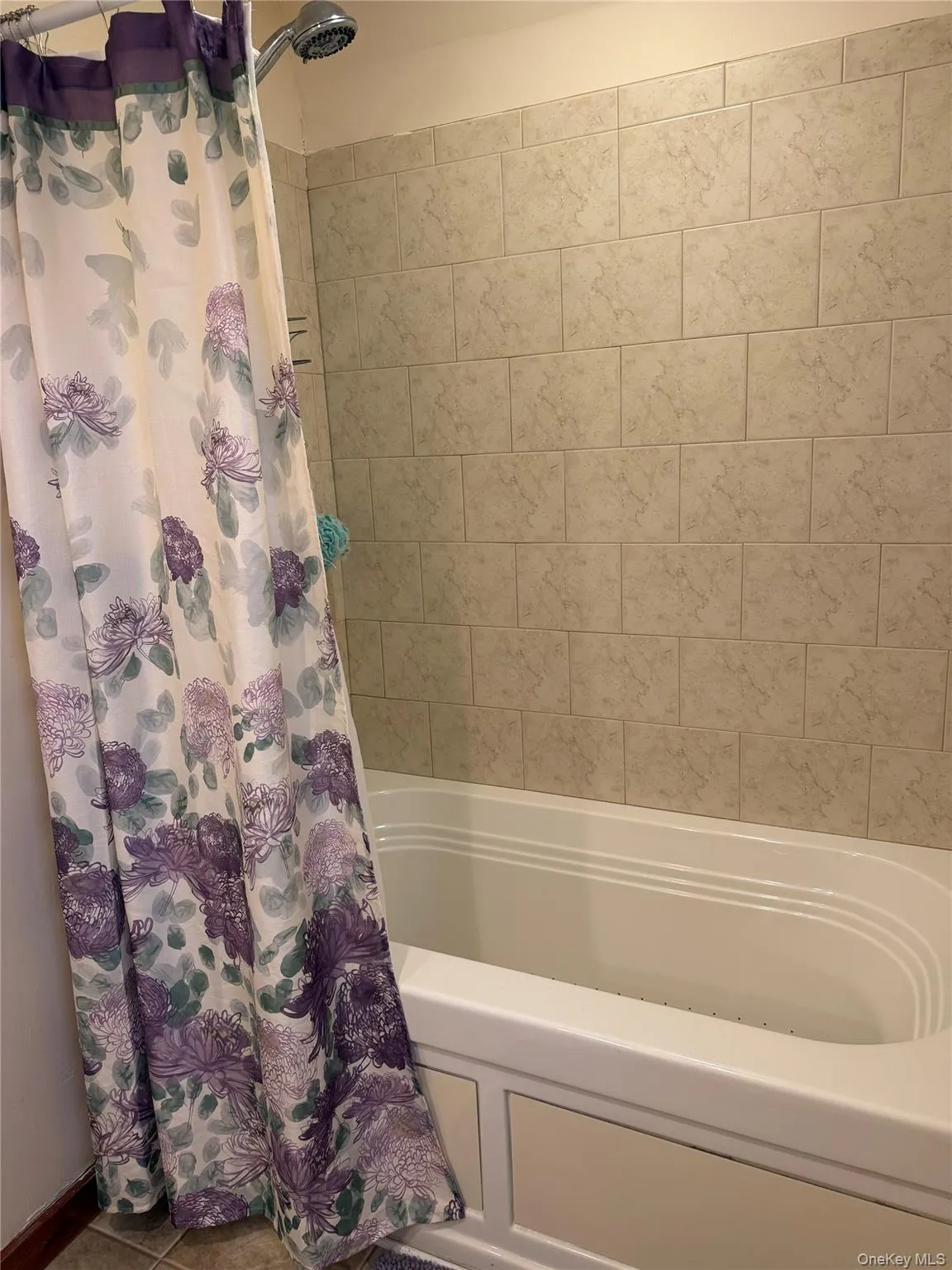 Custom tile surrounding jetted tub Custom tile surrounding jetted tub