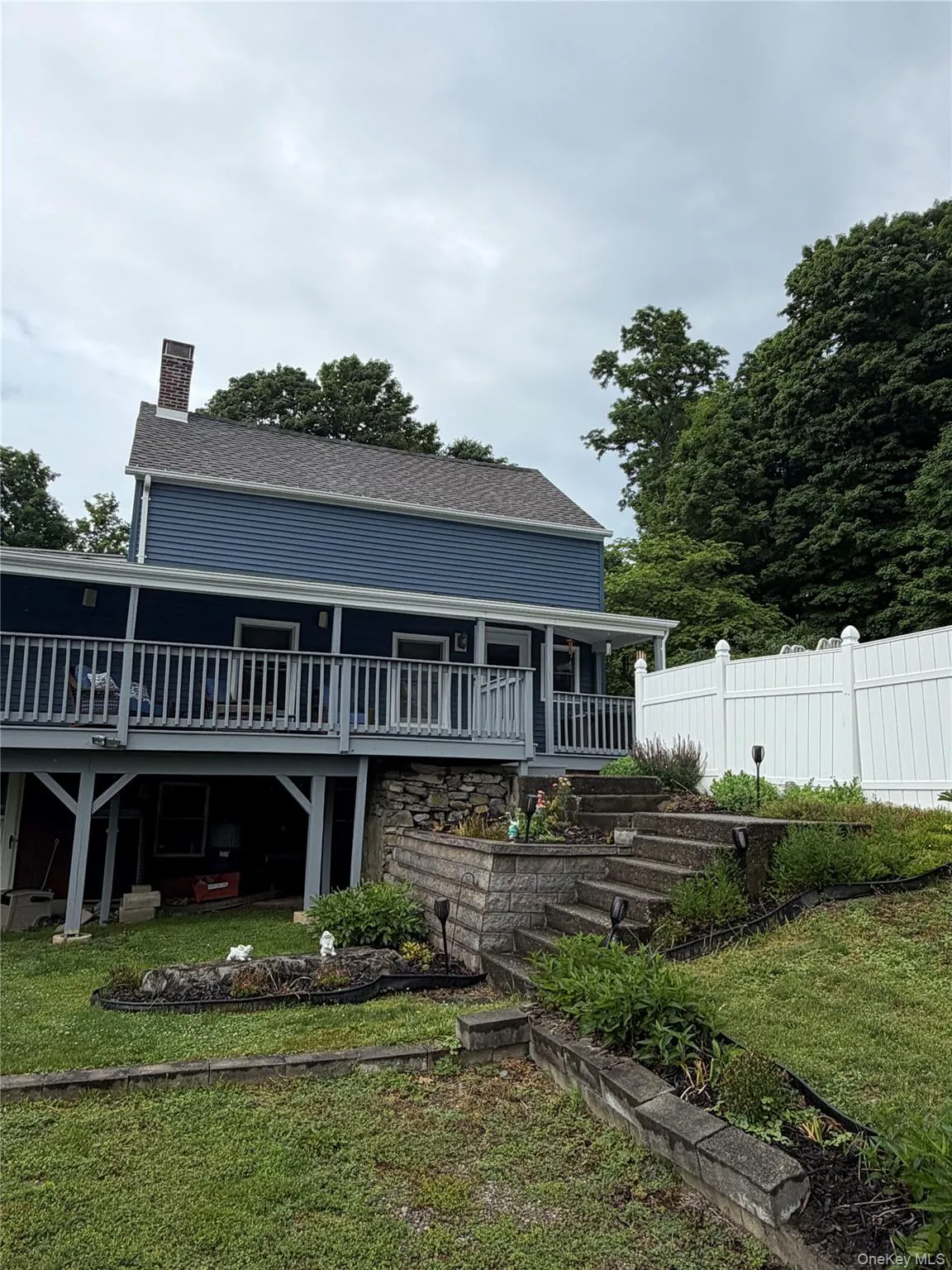 Full Covered Front Porch -- entire width of home. Full Covered Front Porch -- entire width of home.