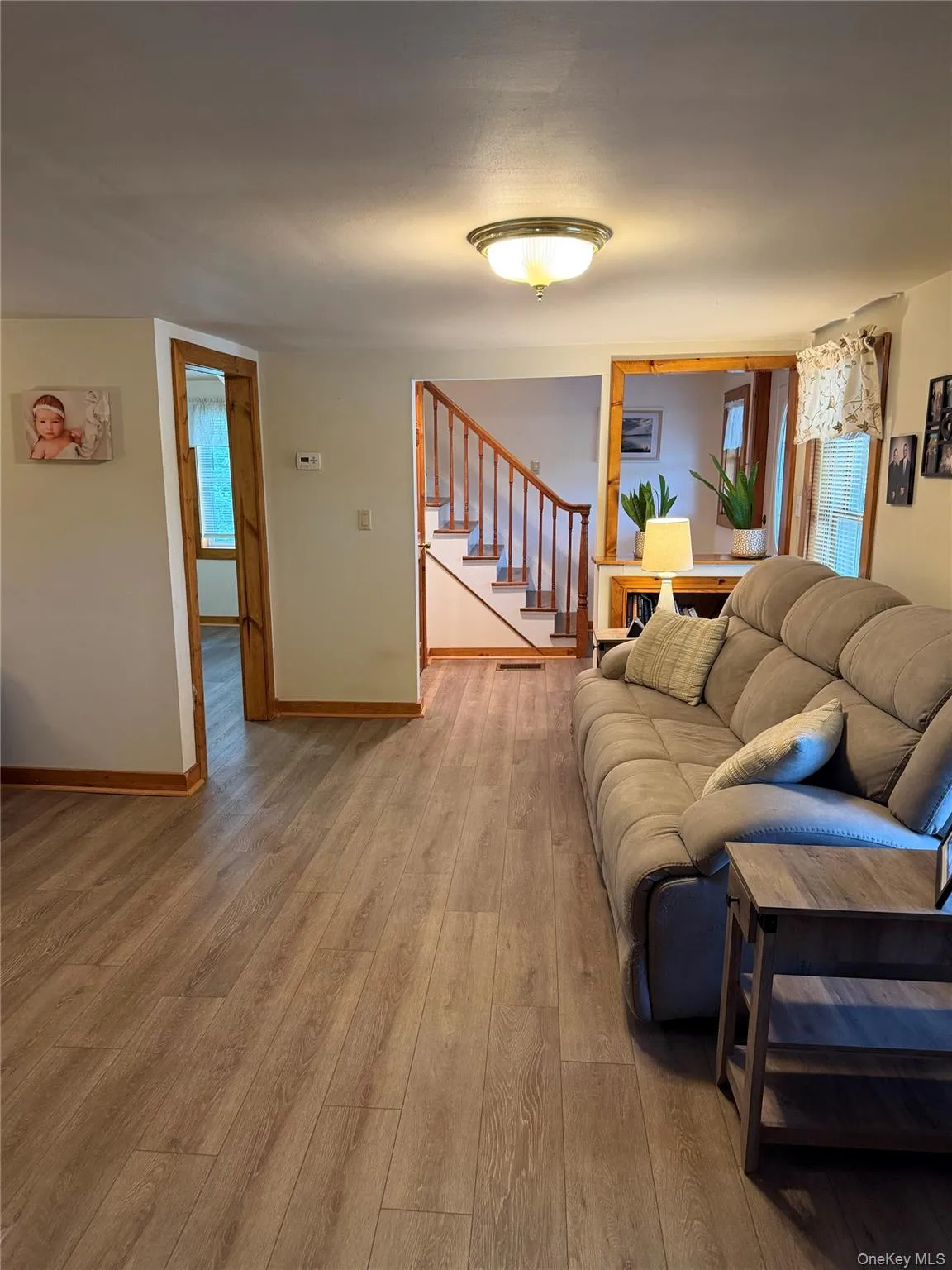 Entry foyer, staircase to second floor and expansive living room. Entry foyer, staircase to second floor and expansive living room.