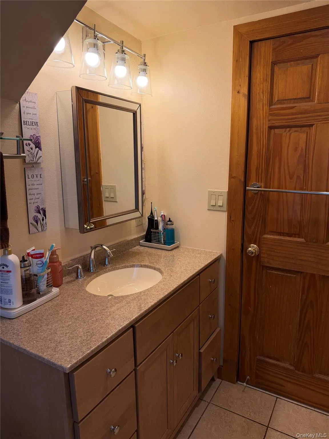 Second floor bathroom mirror and vanity. Second floor bathroom mirror and vanity.
