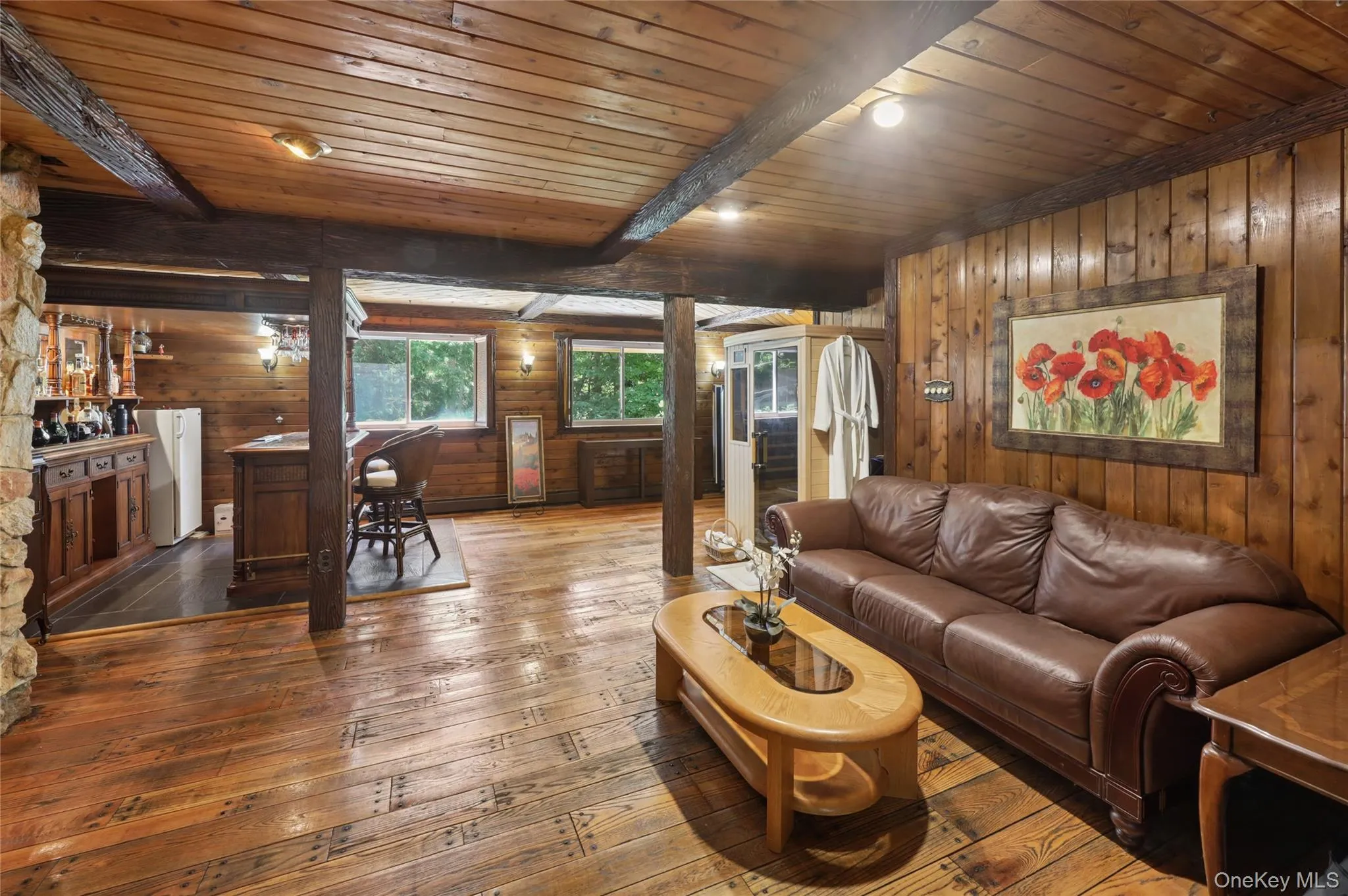 Lower level with walk-out door on side of the house and two large windows. Lower level with walk-out door on side of the house and two large windows.