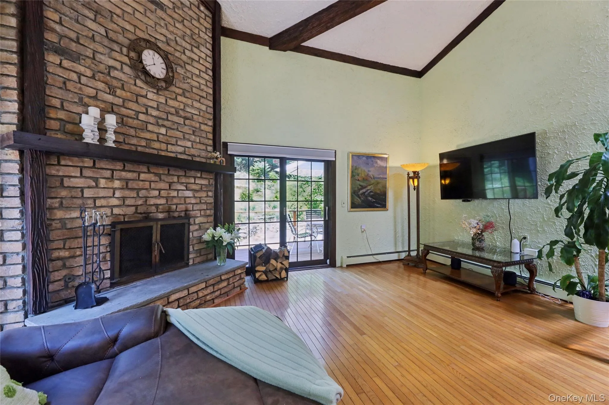 Walk out to wrap around deck through the two slighting doors on both side off the fireplace Walk out to wrap around deck through the two slighting doors on both side off the fireplace